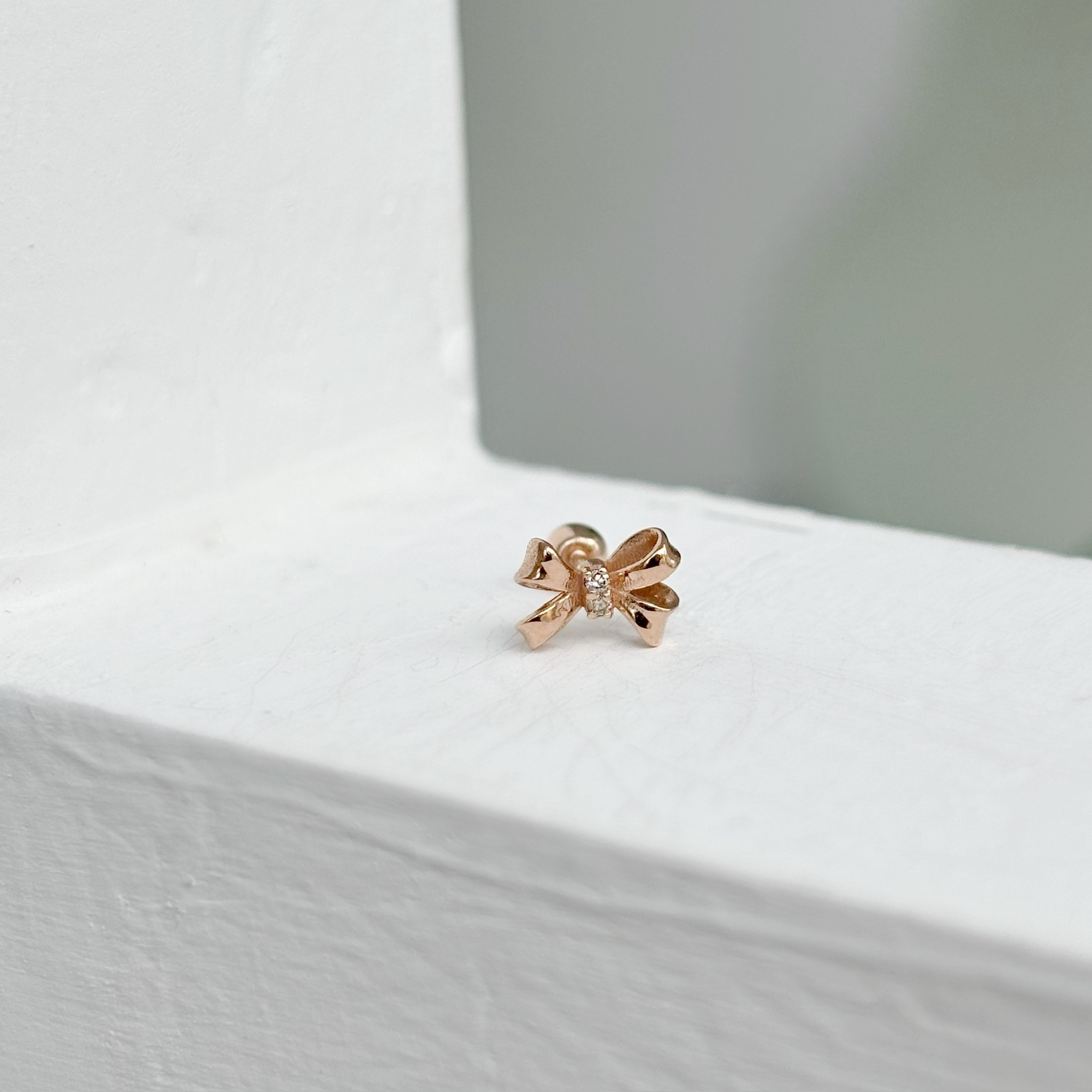 14K立體蝴蝶結真鑽轉珠耳環