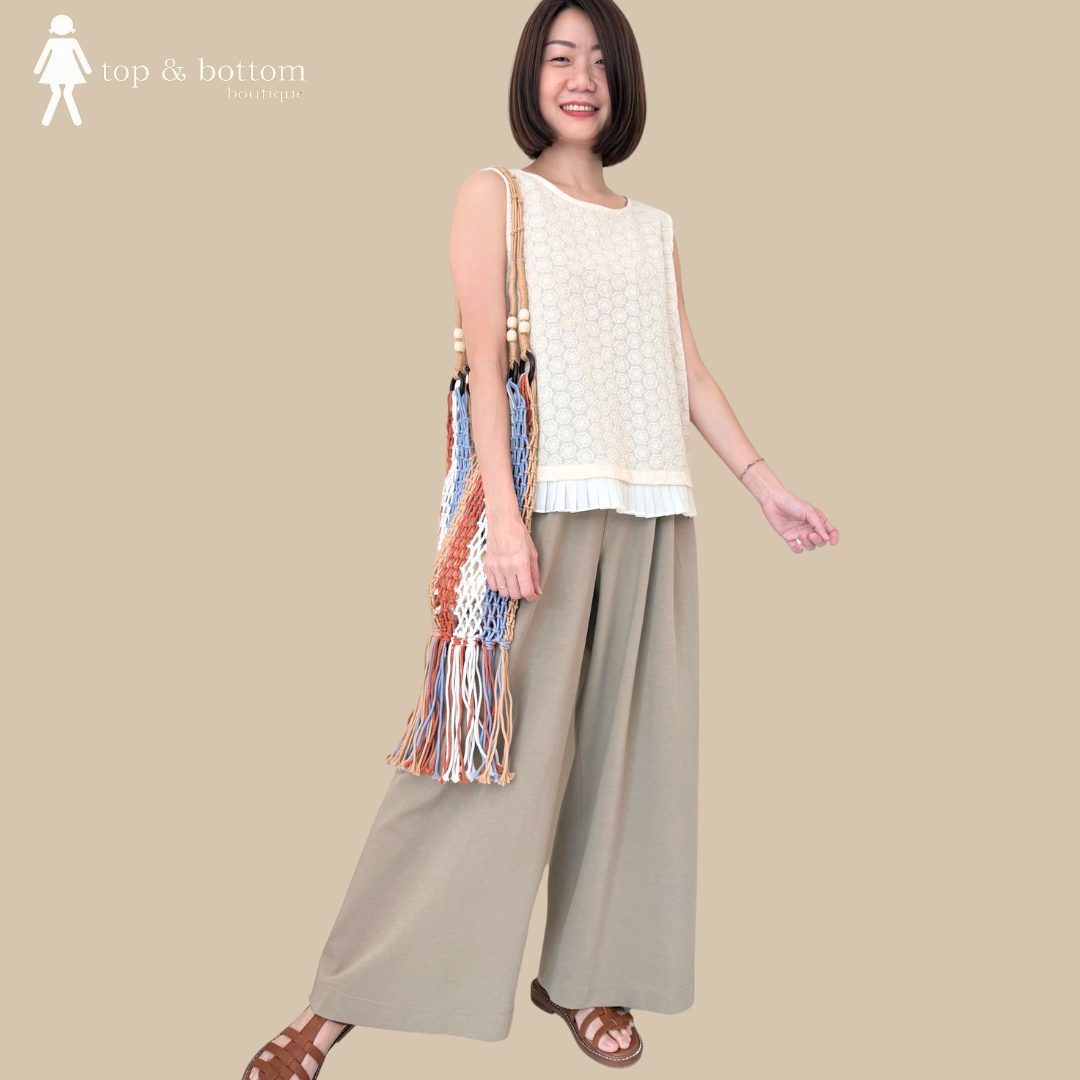 SLEEVELESS EMBROIDERED FLOWER PLEATED HEM BLOUSE