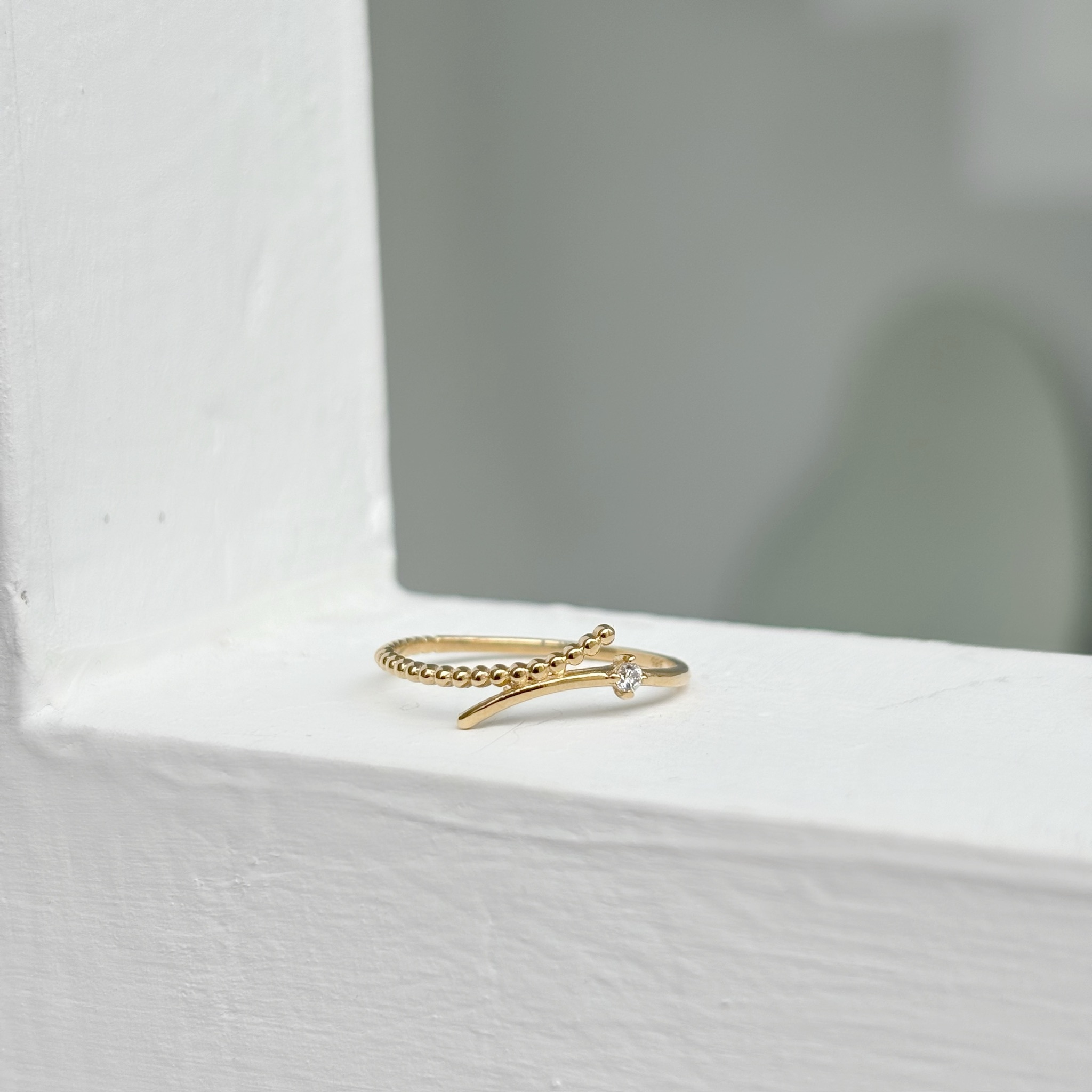 14K曲線點點交錯真鑽戒指