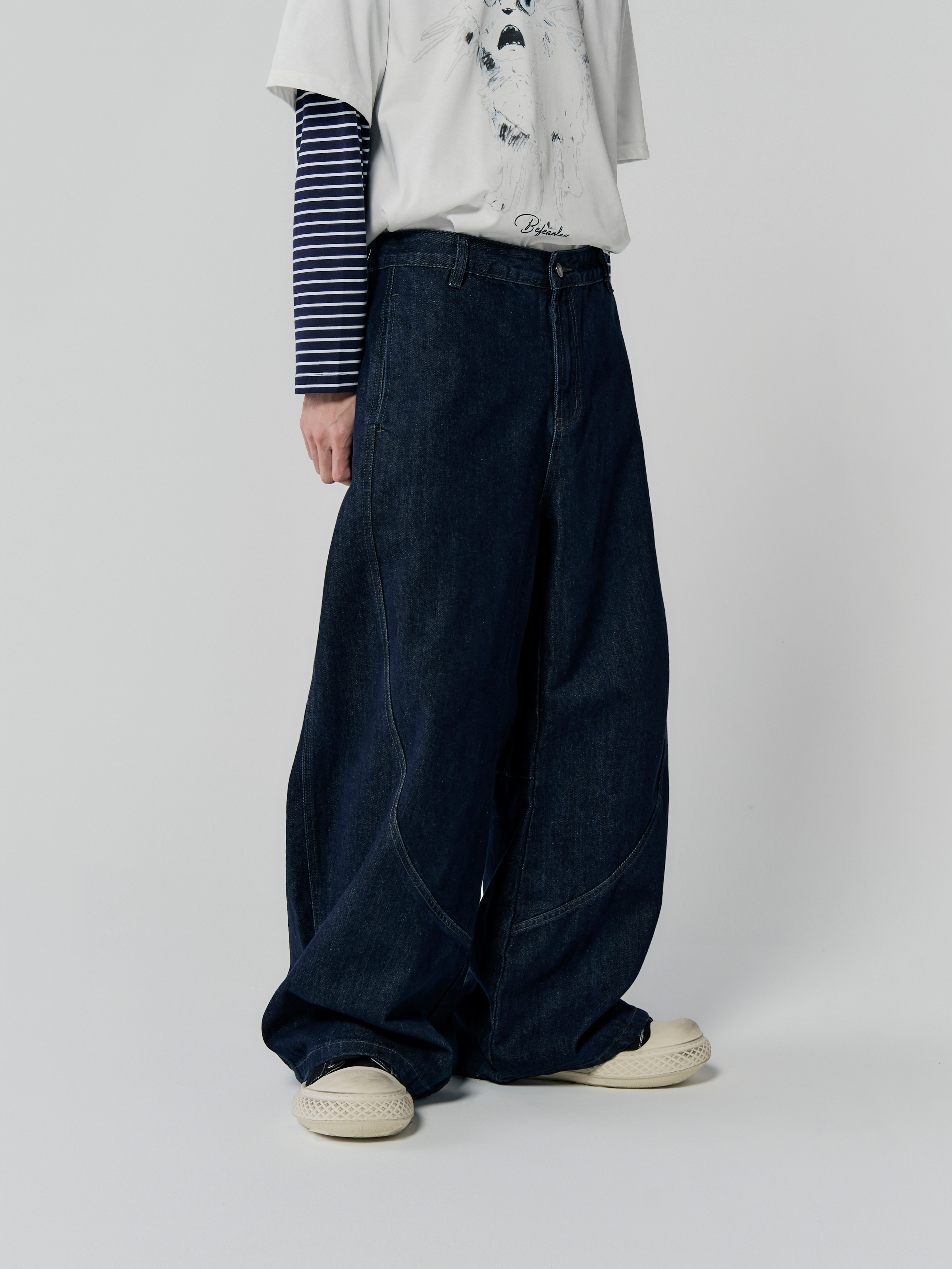 原丹寧弧形彎刀長褲