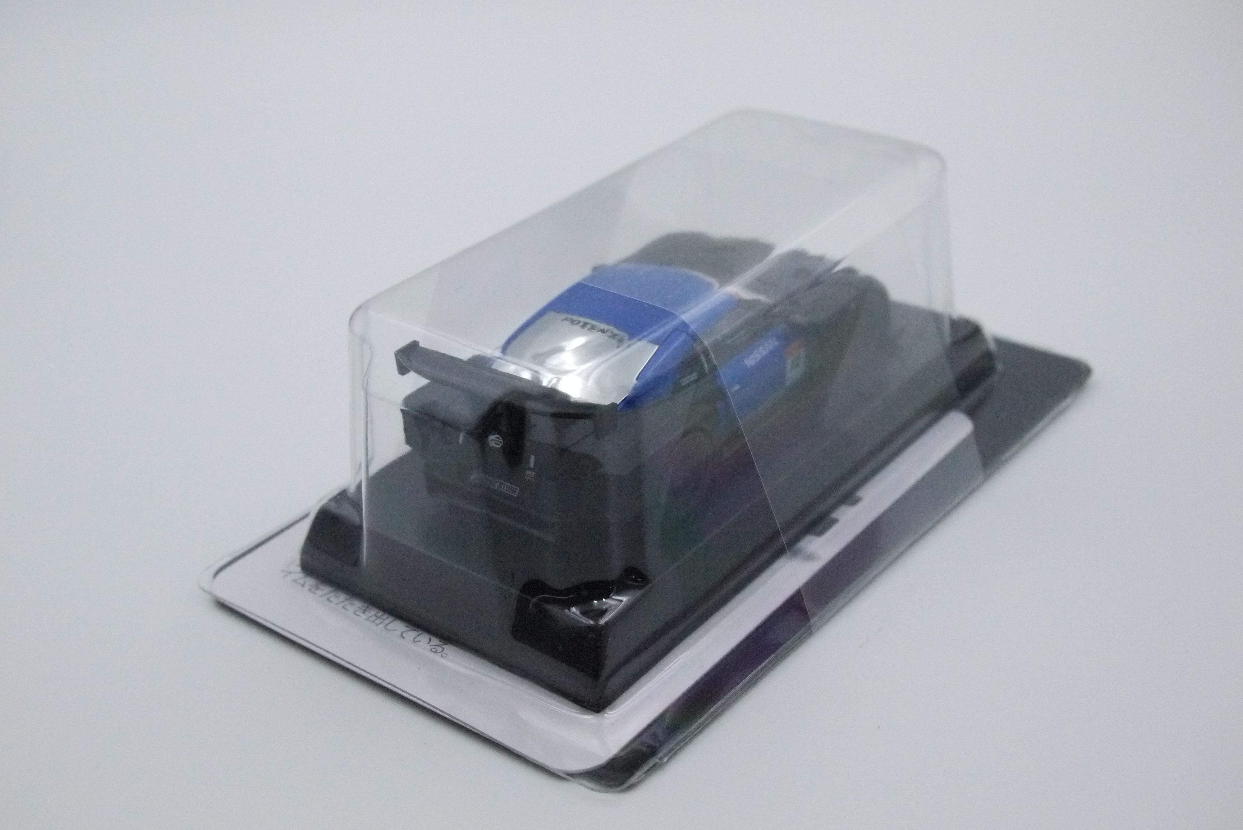 KYOSHO IMPUL CALSONIC GT-R PRE SEASON TEST CAR #12 BLUE AND BLACK