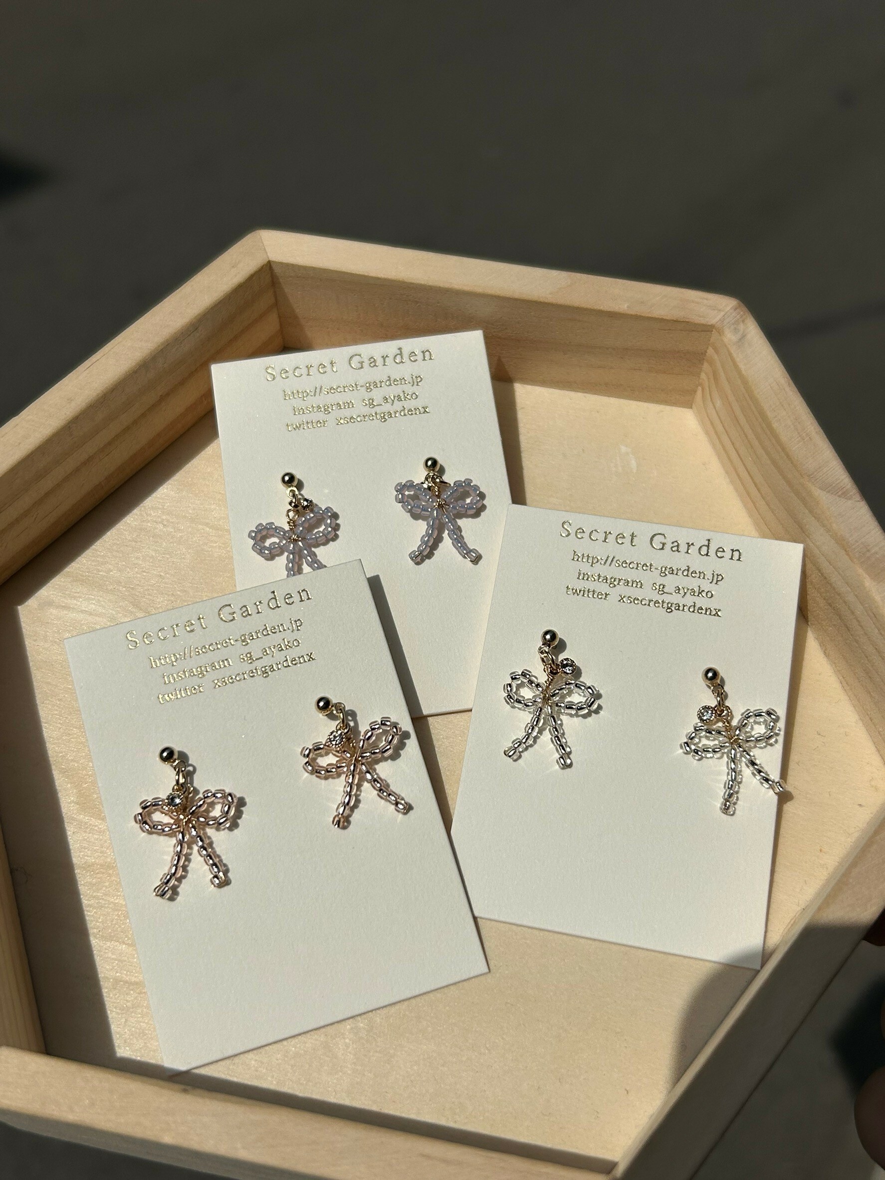 [secretgarden] 寶石串珠蝴蝶結耳環 | 銀色 | 耳夾 | NO.43