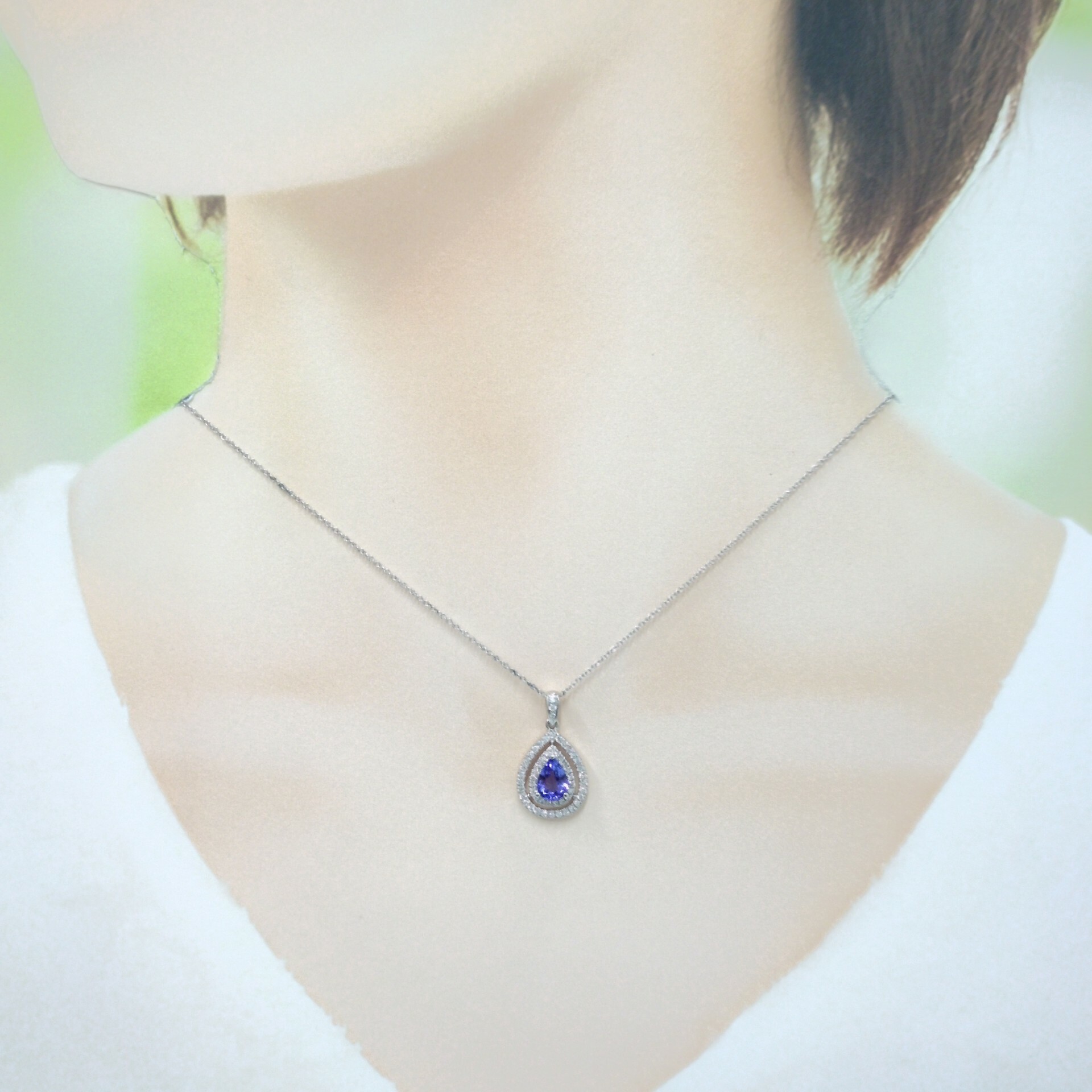 18K White Gold 0.75ct Tanzanite and Diamond Pendant