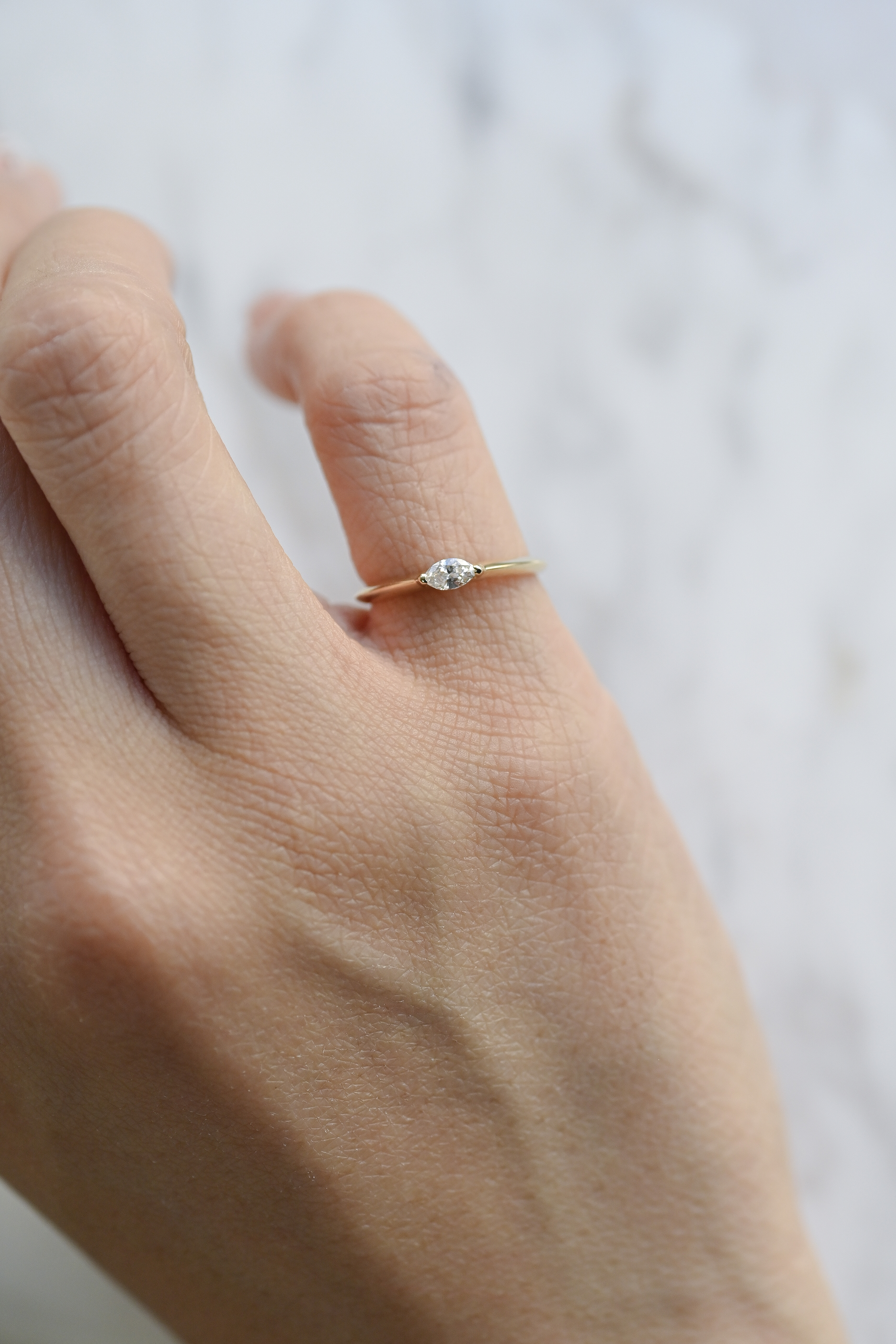 18K 0.10ct Marquise Ring