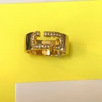[S] MARC JACOBS GOLD/CRYSTAL LOGO SHAPE WITH SURROUNDING STONE RING, J402MT2RE22-722 (SMJ475)