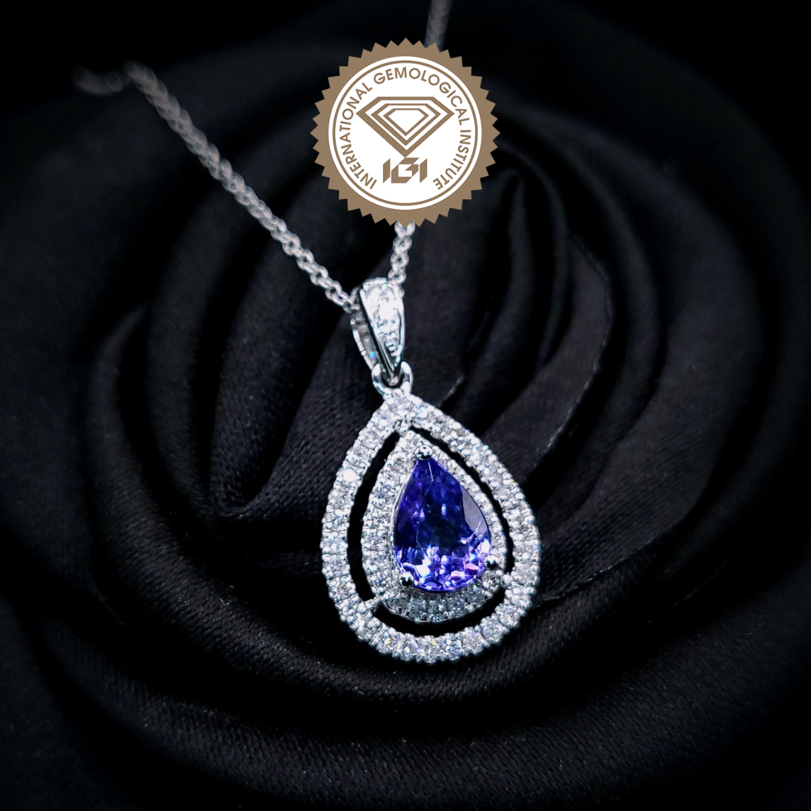 18K White Gold 0.75ct Tanzanite and Diamond Pendant