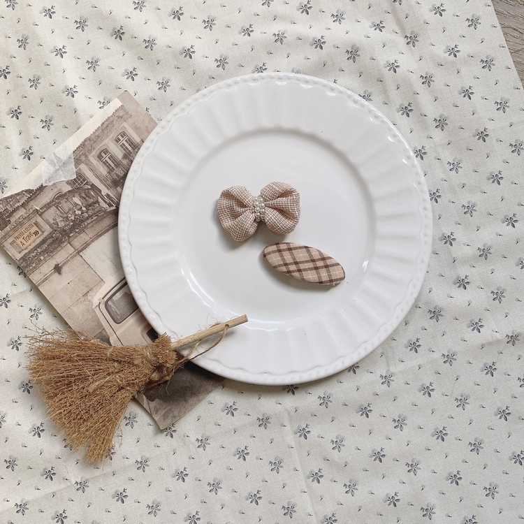 粉色珍珠蝴蝶結髮夾