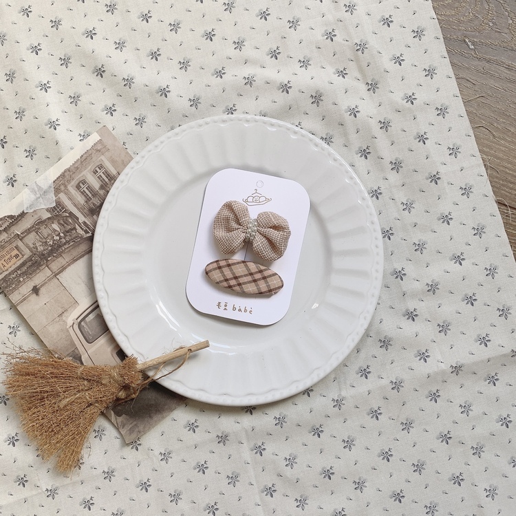 粉色珍珠蝴蝶結髮夾