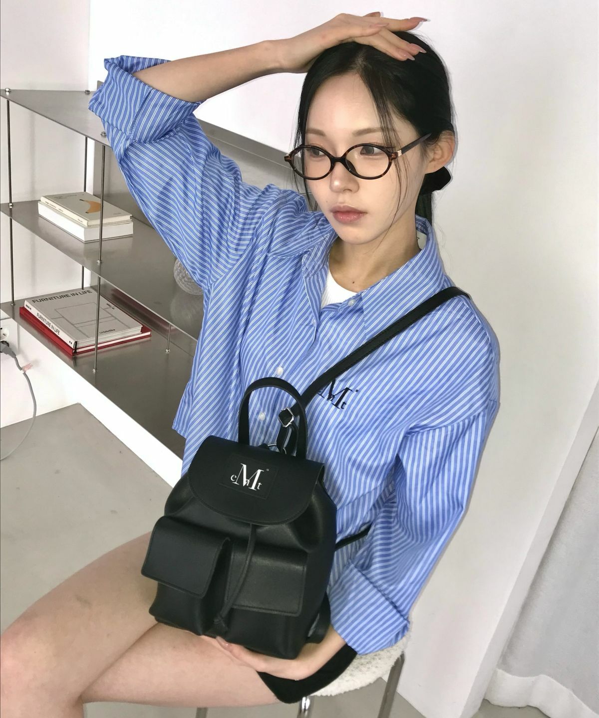 MUCENT AREN TWO POCKET LEATHER MINI BACKPACK UNISEX