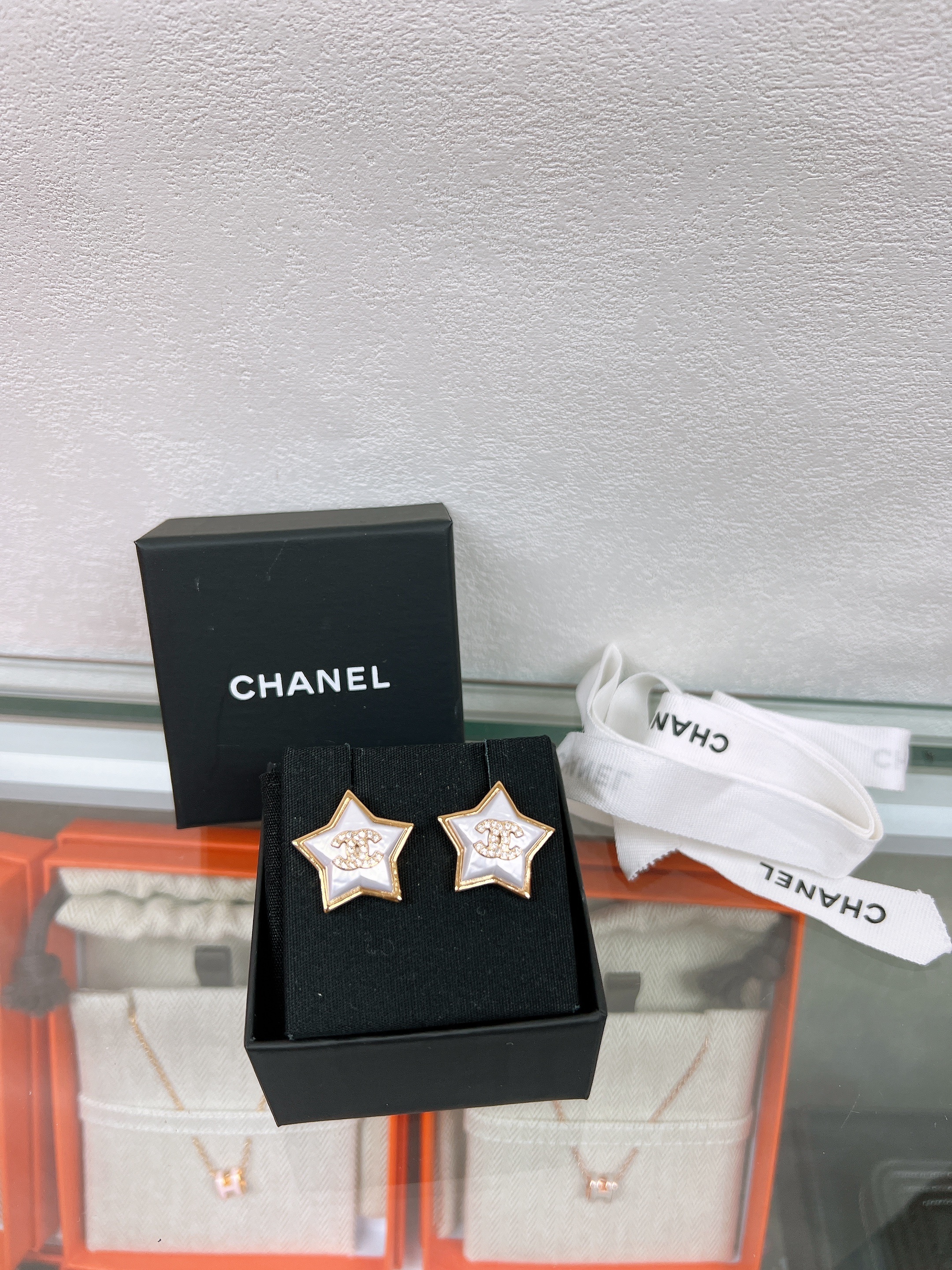 *Unused* Chanel earrings white star 24c