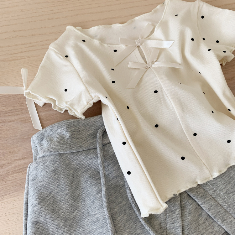 蝴蝶結點點捲邊上衣