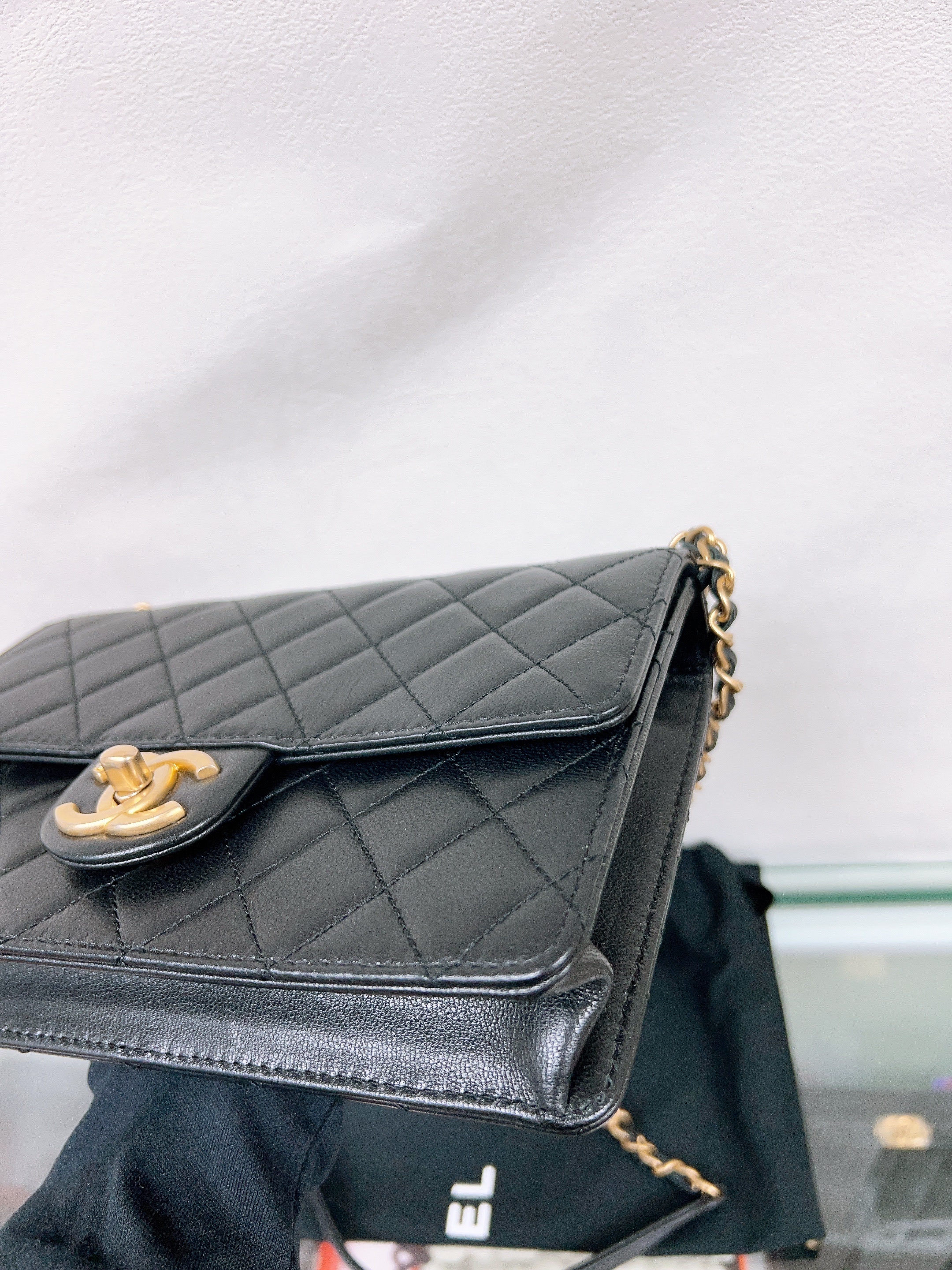 Chanel pearl flap bag black