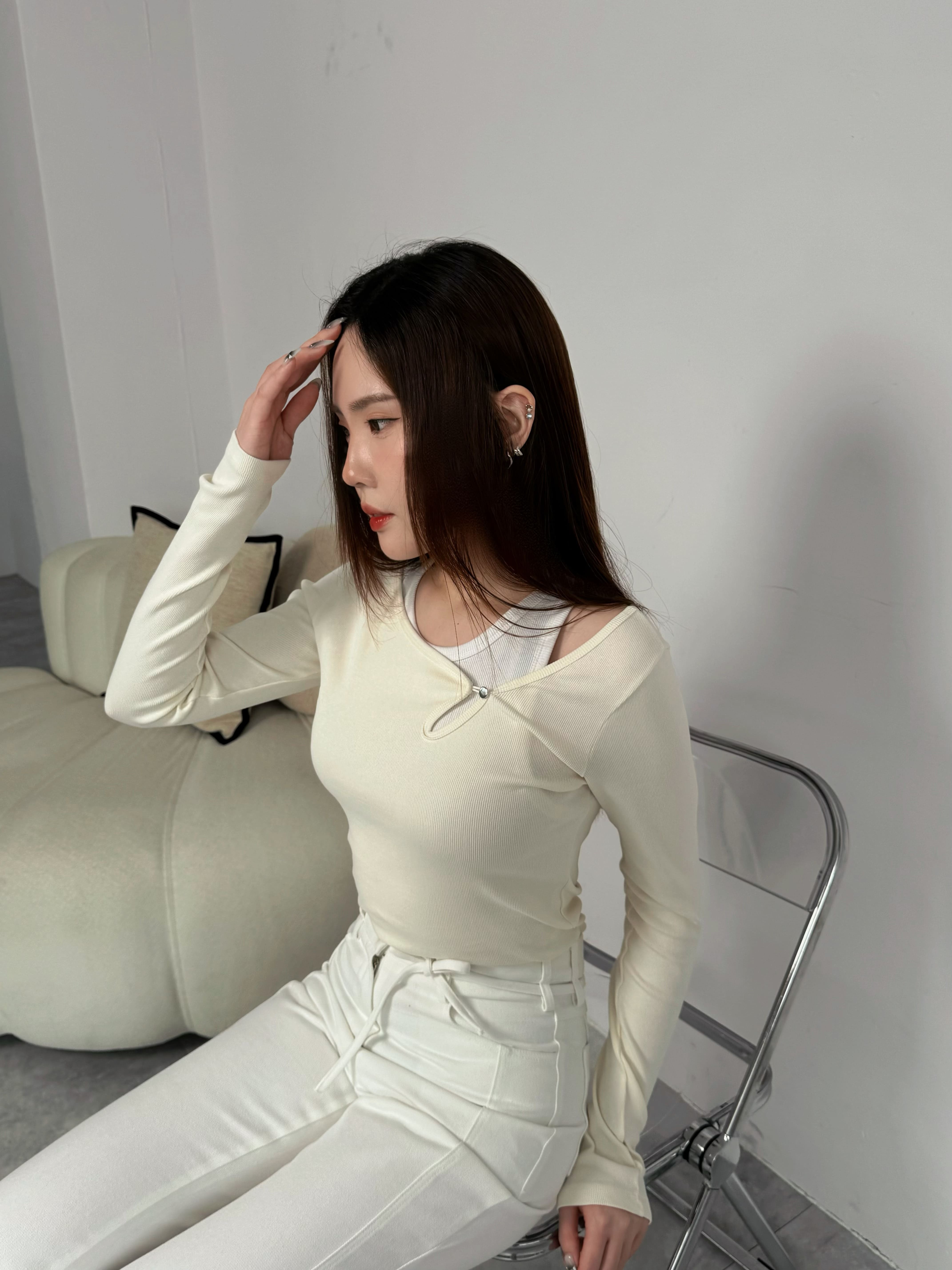 單釦不規則剪裁上衣