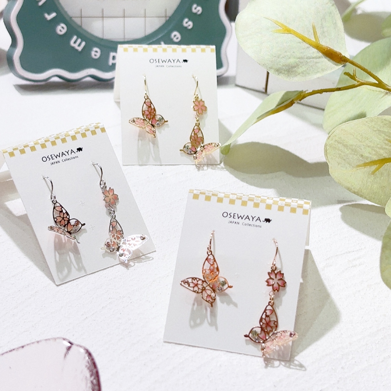 [日本制] 櫻花蝴蝶耳環 (防敏感)