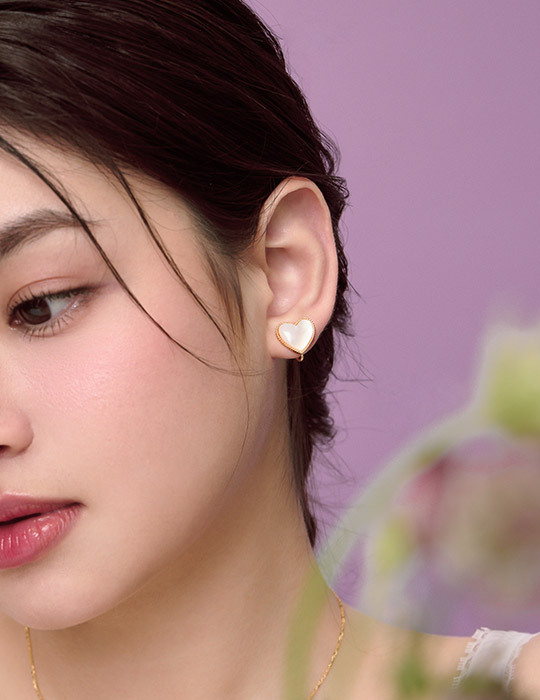 珠邊設計貝殼愛心。夾式耳環