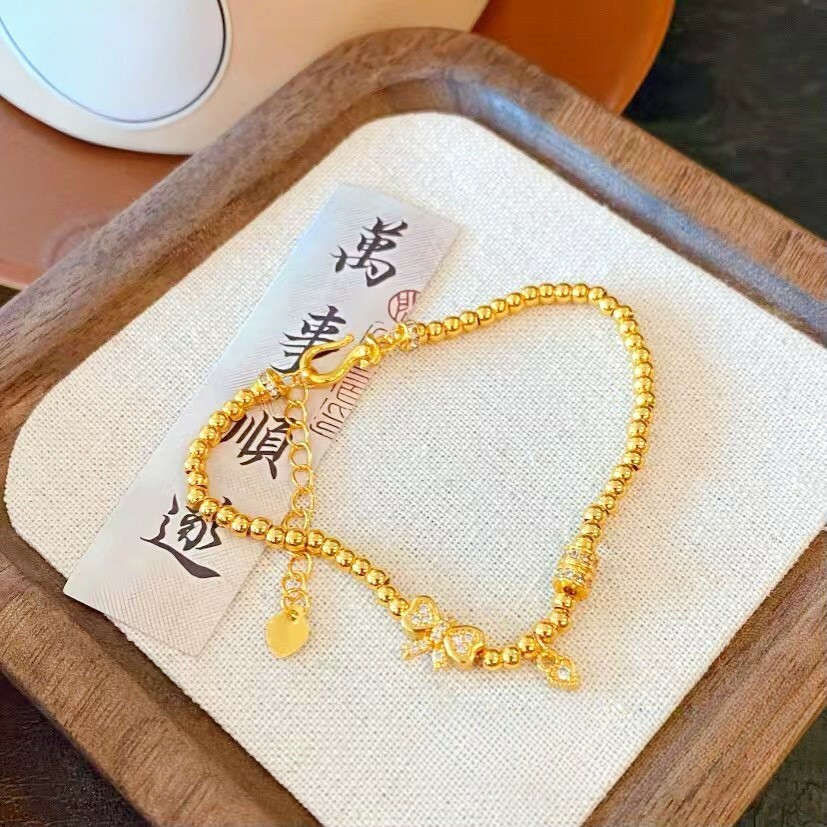 【金輝】點鑽愛心蝴蝶結轉運古法沙金手鍊