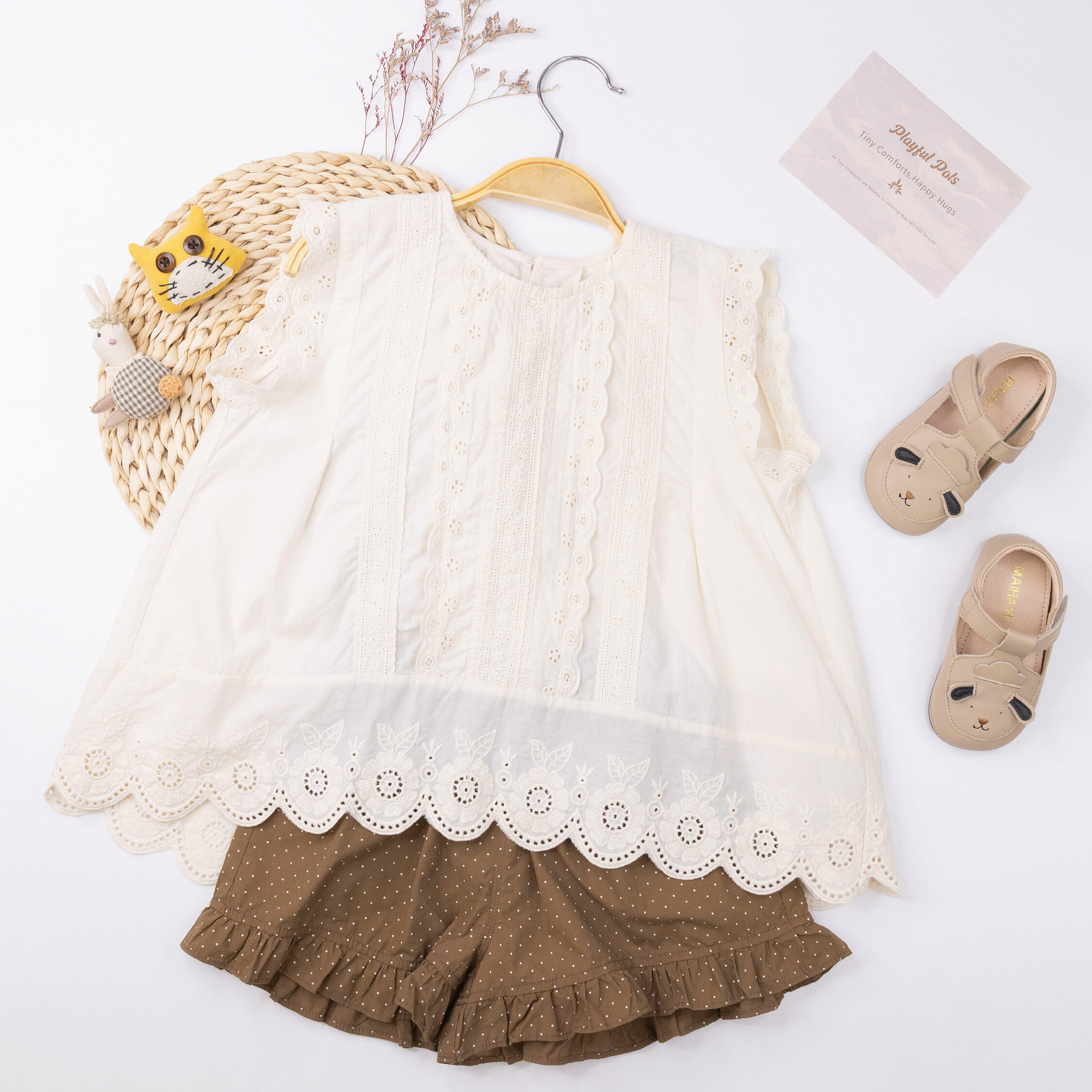 【H50197】日系緹花前短後長設計上衣