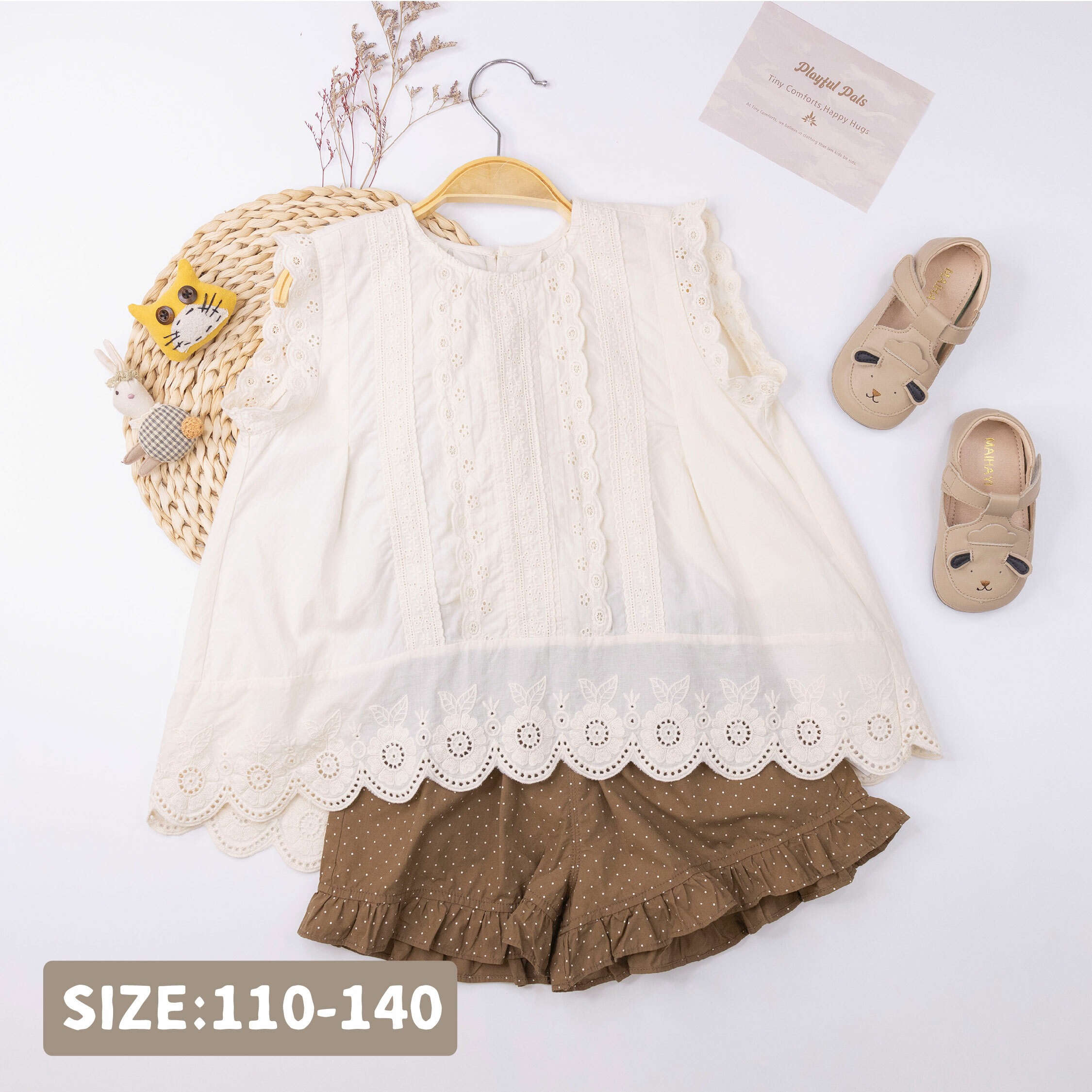 【H50197】日系緹花前短後長設計上衣