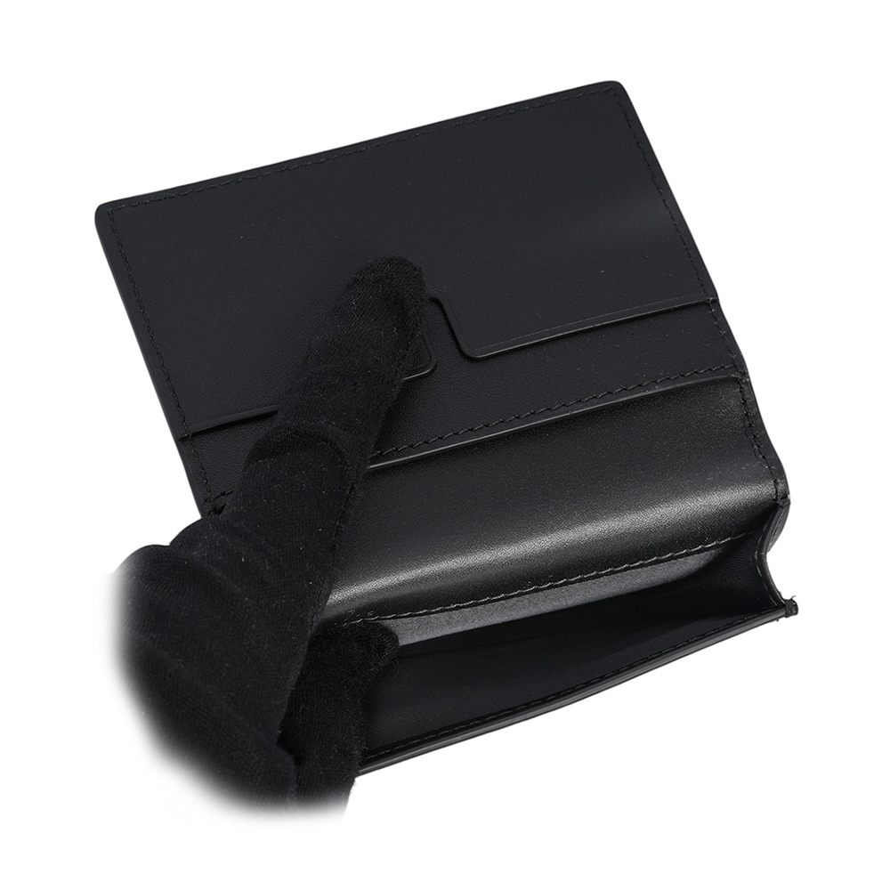 【BURBERRY】經典格紋浮雕小牛皮二折名片夾/卡片夾(黑色) 8079772