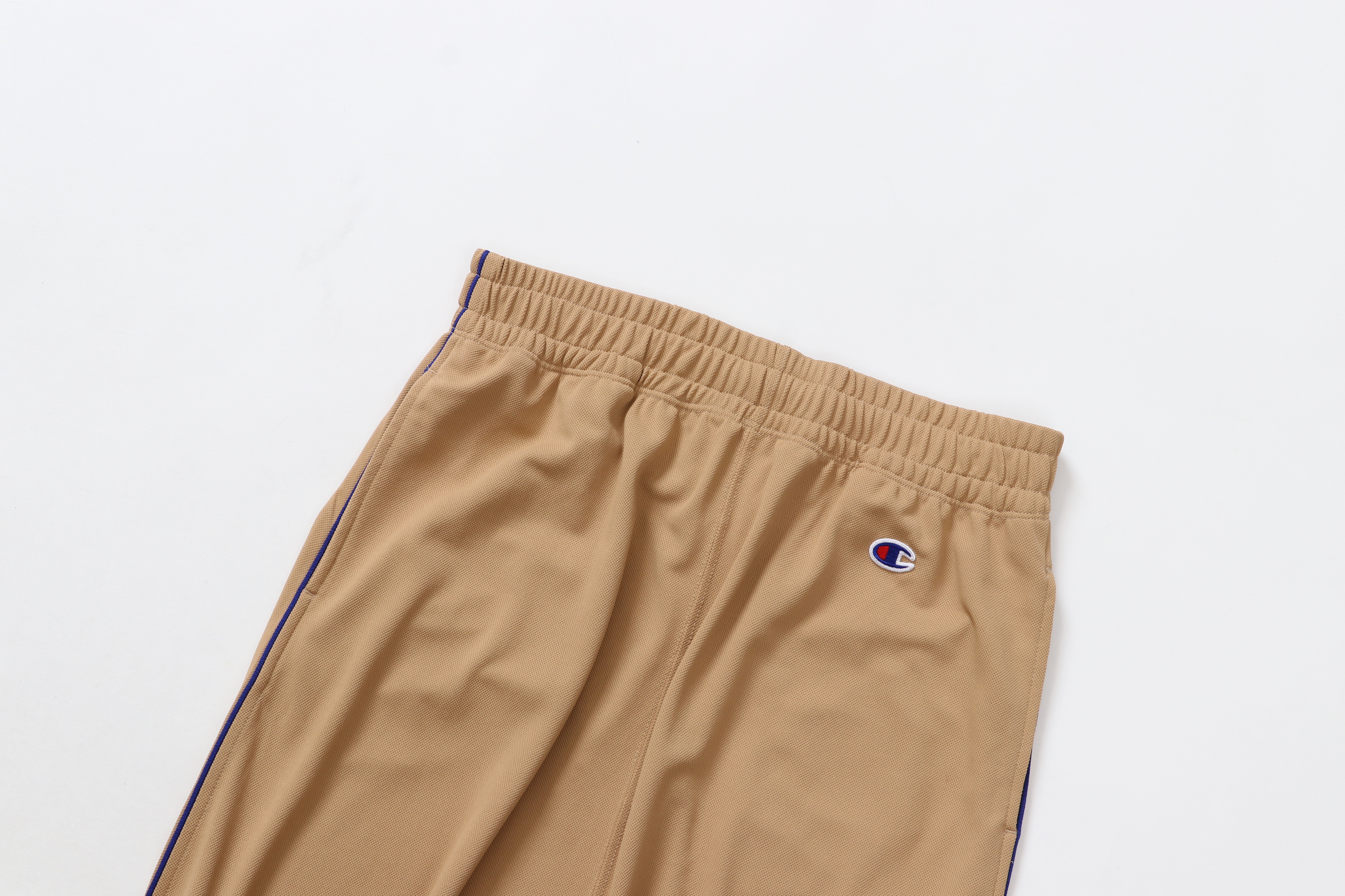 女款-CASUAL機能 素面 拼接 邊條 長裙-卡其（CW-B210-790）