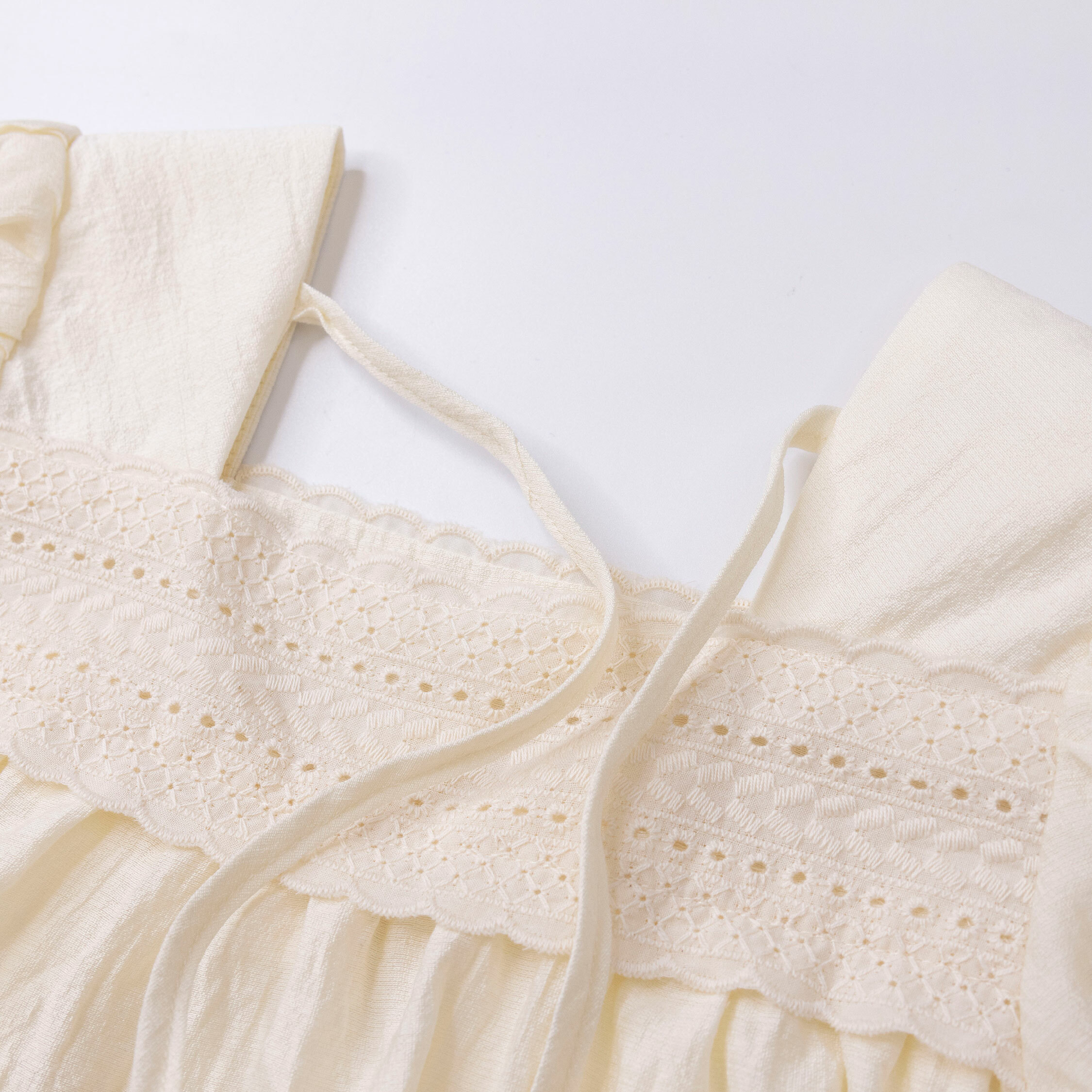 【H50123】氣質緹花後綁帶設計上衣