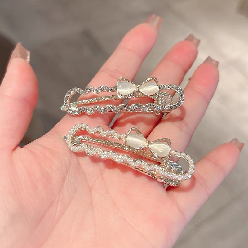[4 FOR RM10] Korean Rhinestone Cat Eye Bow Hair Clip