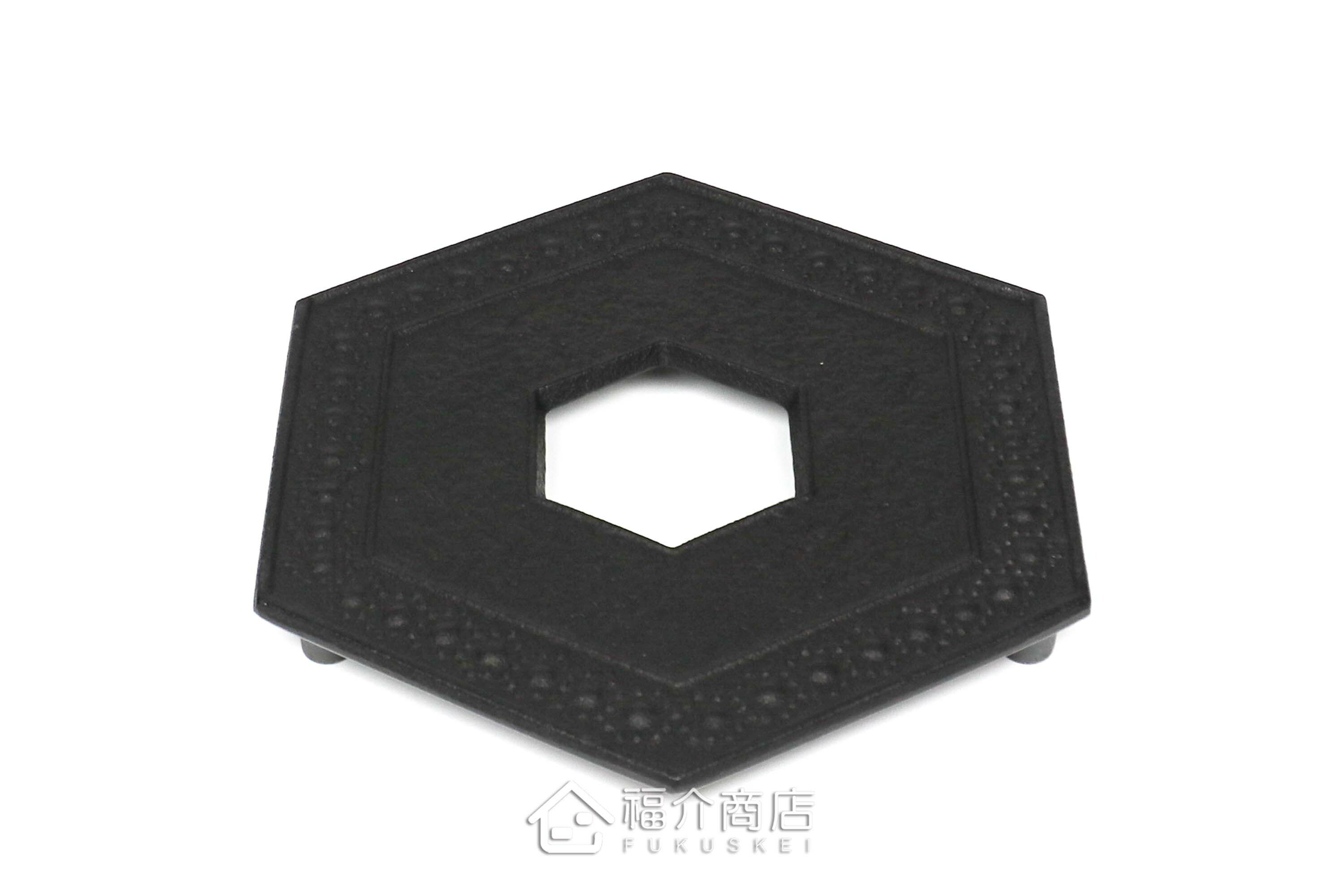 黑色六角龜甲造型放茶壺或鍋子的鑄鐵隔熱墊