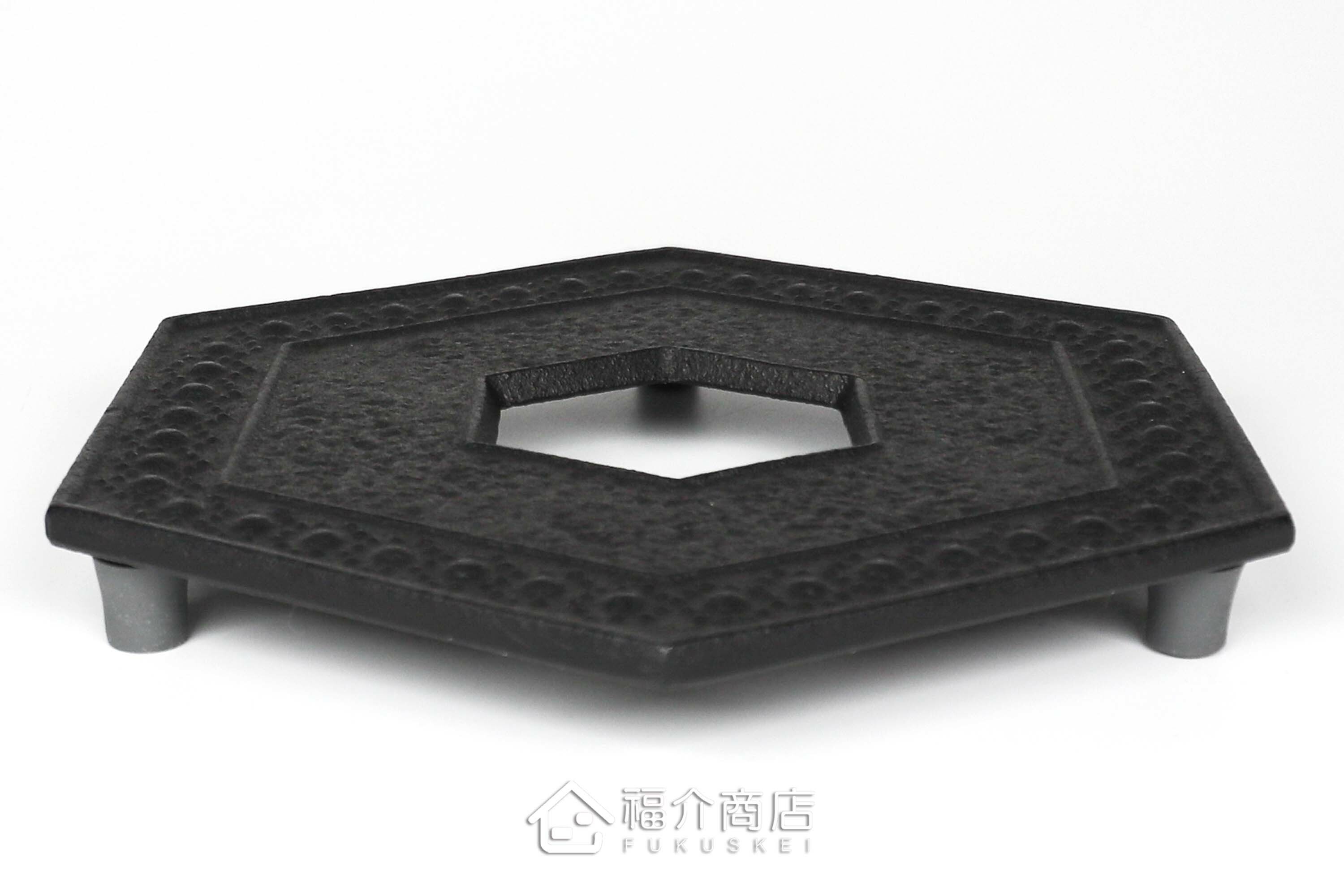 黑色六角龜甲造型放茶壺或鍋子的鑄鐵隔熱墊
