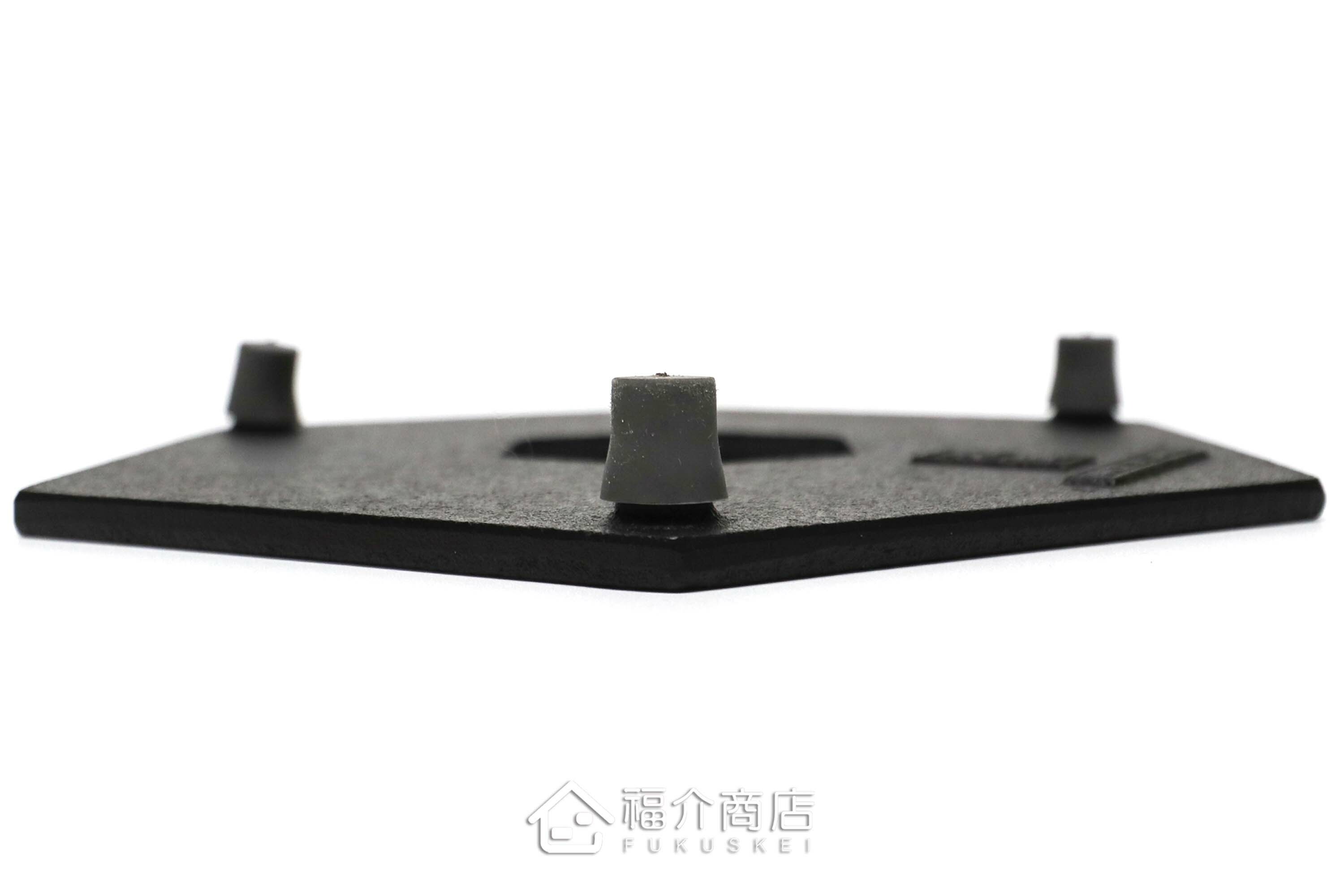 黑色六角龜甲造型放茶壺或鍋子的鑄鐵隔熱墊