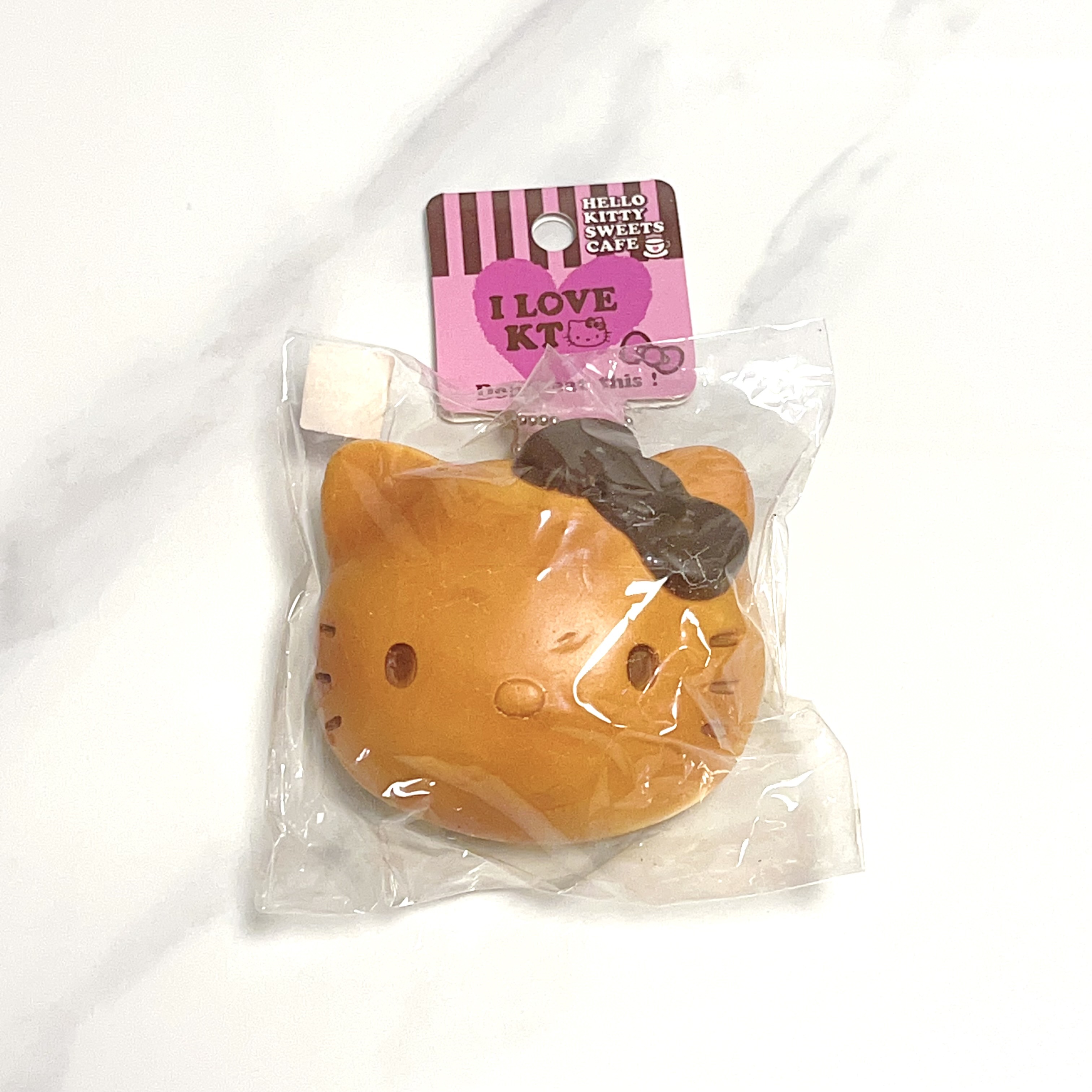 2009 vintage Hello Kitty sweet cafe head bun bread squishy