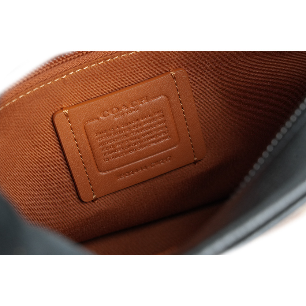 【COACH】Warner 塗層帆布及皮革拉鍊斜背包(棕褐色/黑色) CW217 QBNRX