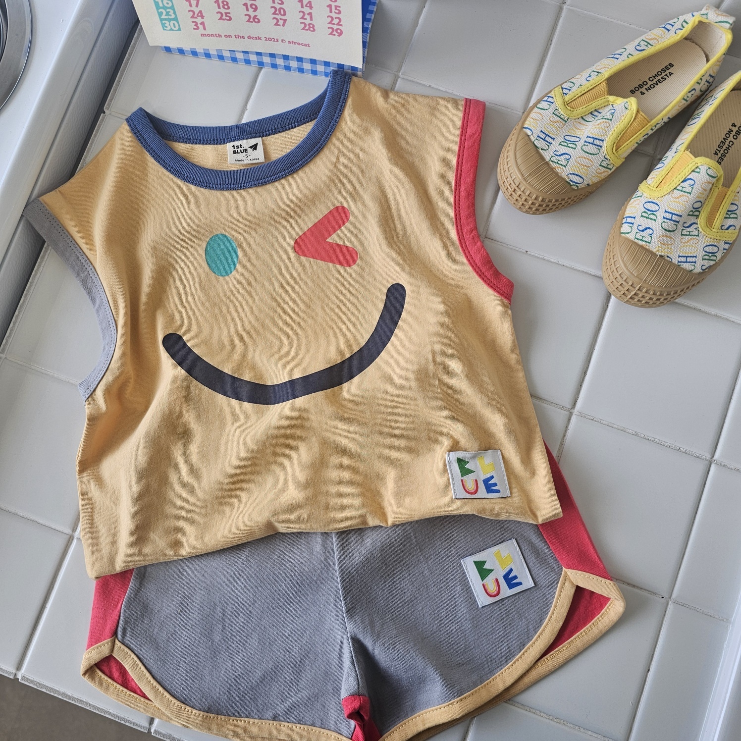 韓國 1st Blue - 25夏 俏皮表情塗鴉背心（兩色）