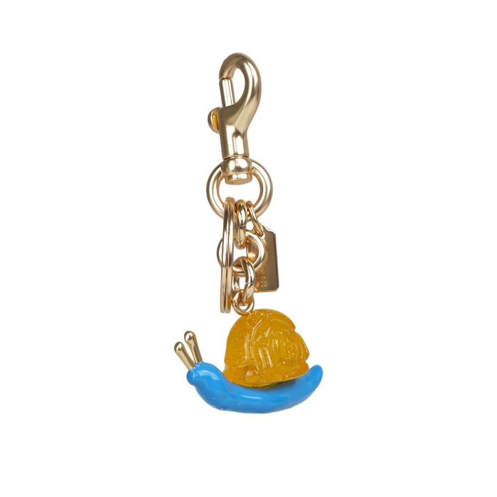 【COACH】COACH X OBSERVED BY US 蝸牛造型吊飾/鑰匙圈(金色/藍色)