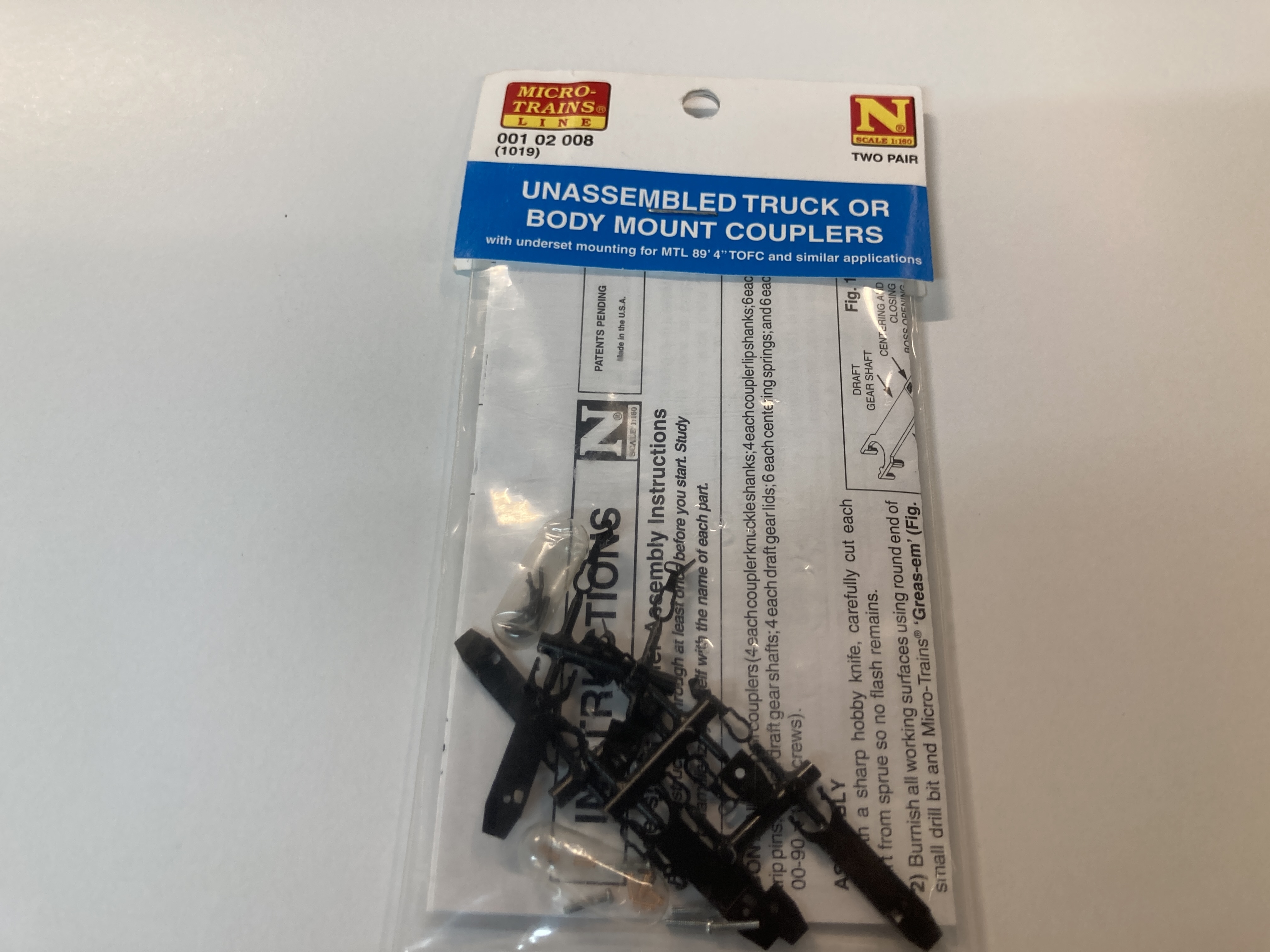 Micro-Trains N 00102008 (1019) Truck or Body Mount Couplers (2 pair, Unassembled) with under set mouting for MTL 89'4" TOFC and similar applications