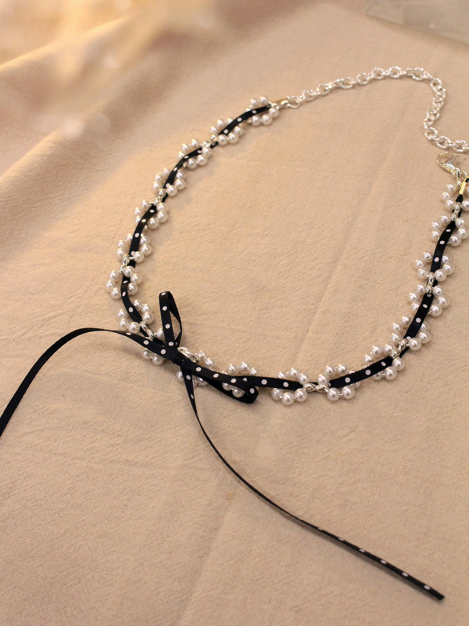 屬貓的莉莉。MUCHAT手作14KGP珍珠點點蝶結項鍊