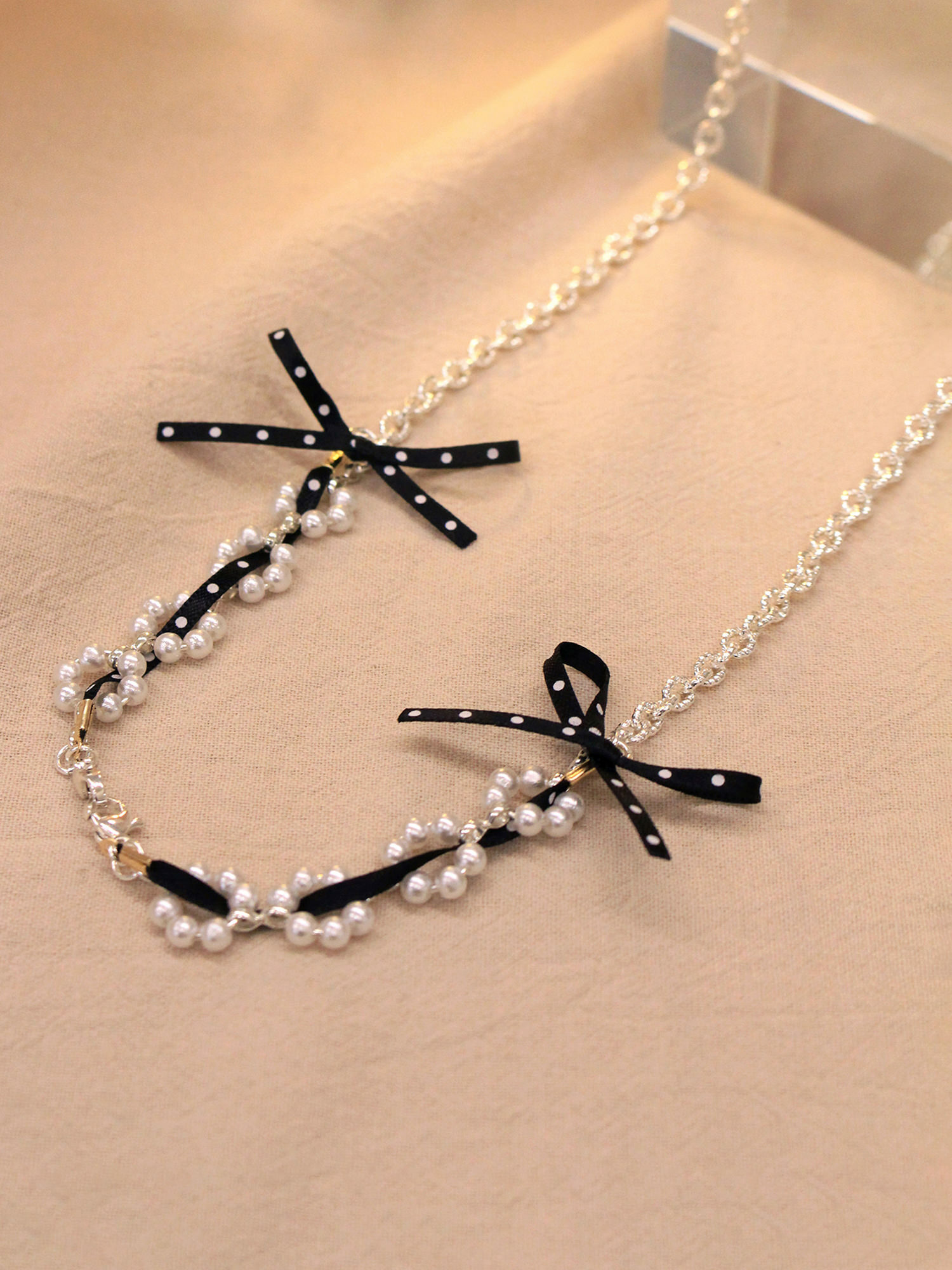 屬貓的莉莉。MUCHAT手作14KGP珍珠點點蝶結腰鍊