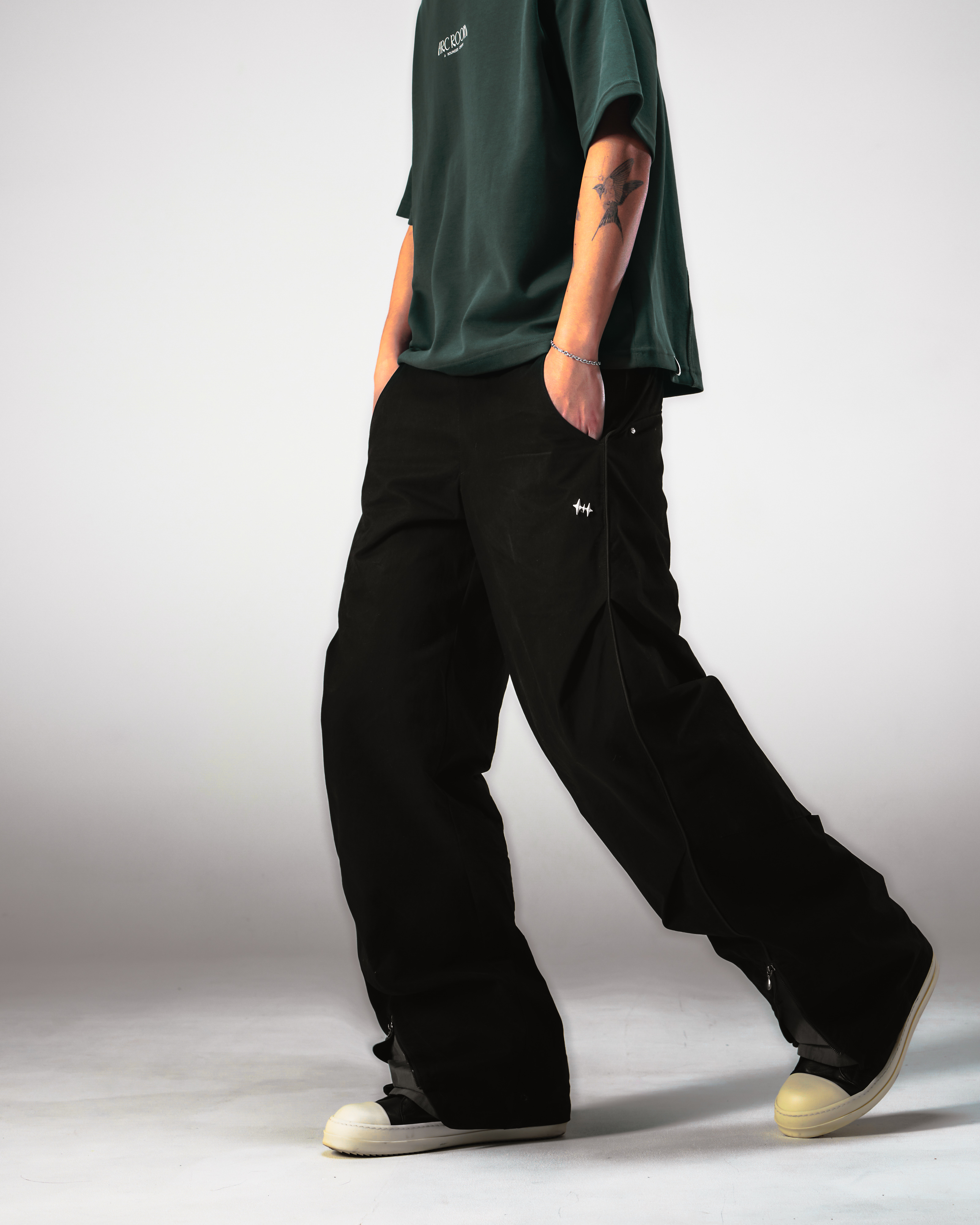 SPIRAL CUT PLEATED TROUSERS - BLACK