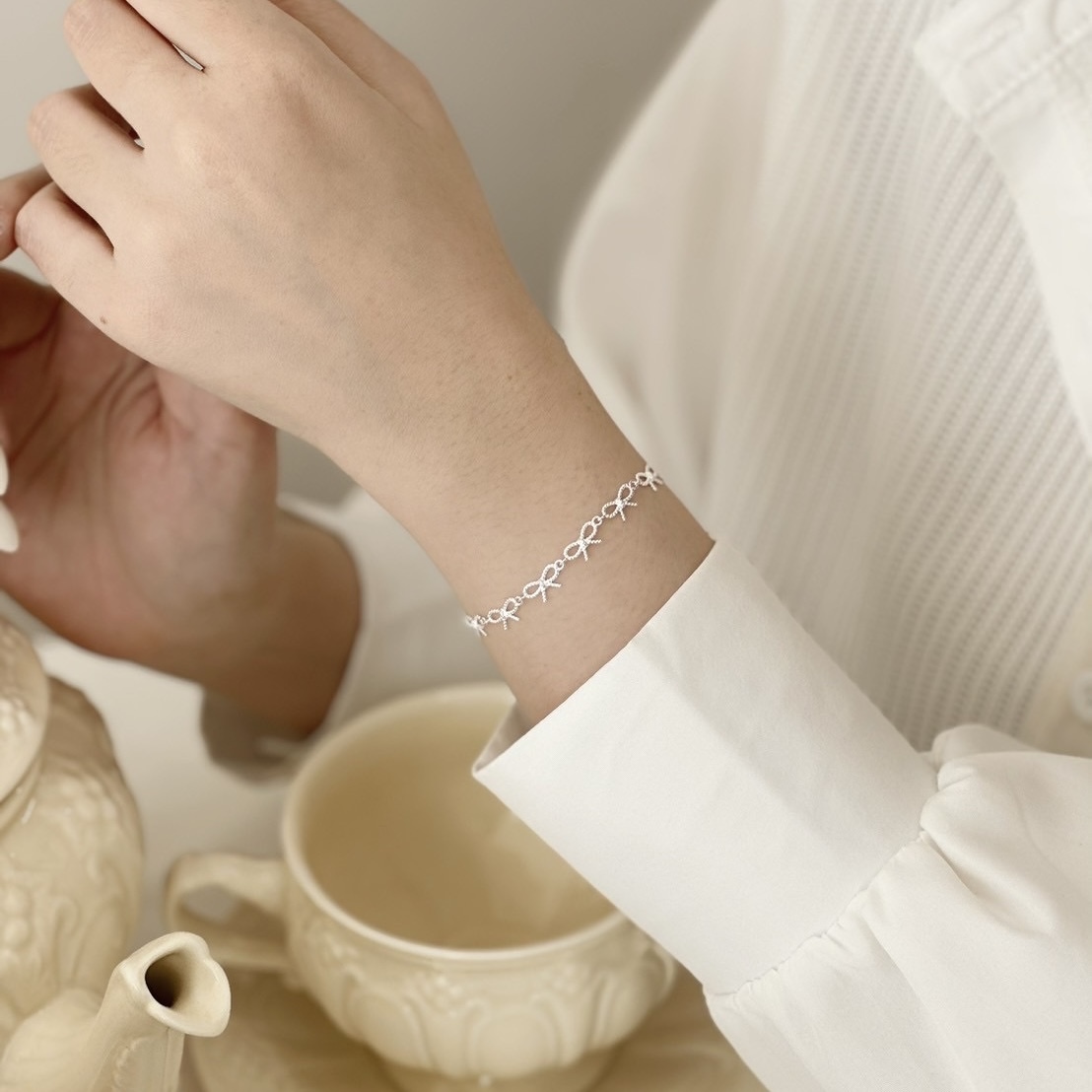 Q01滿圈麻花蝴蝶結純銀手鍊