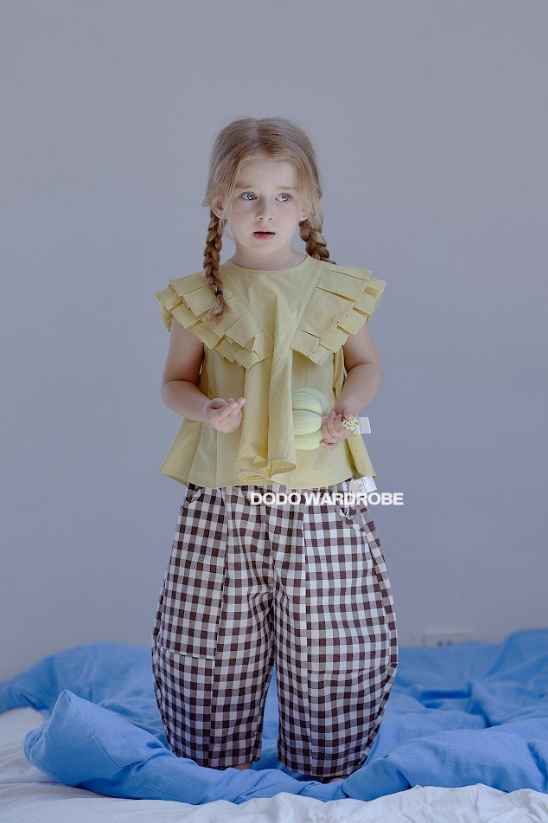 DDB04T025YW   DODO Wardrobe - 黃色設計感層次上衣