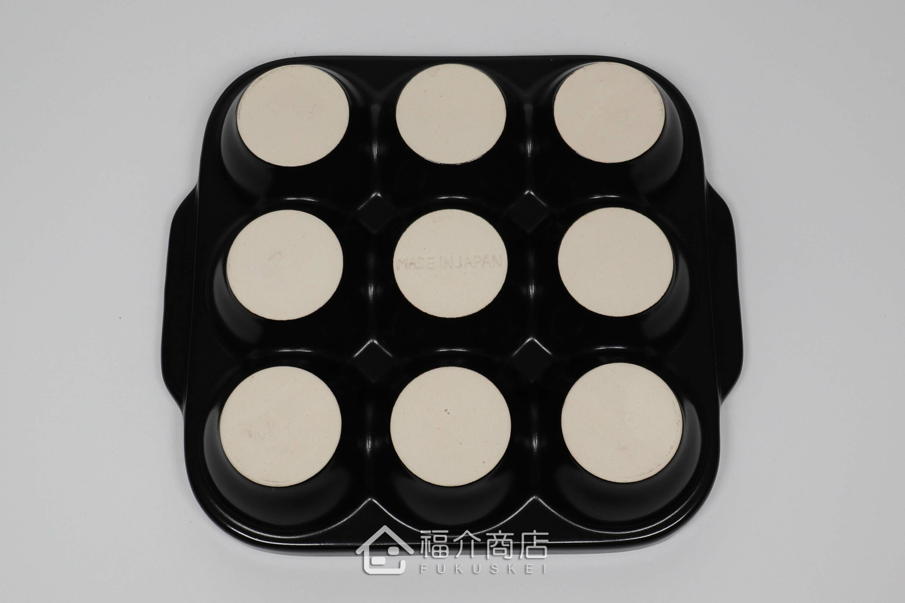 製作章魚燒的耐熱陶瓷烹飪器