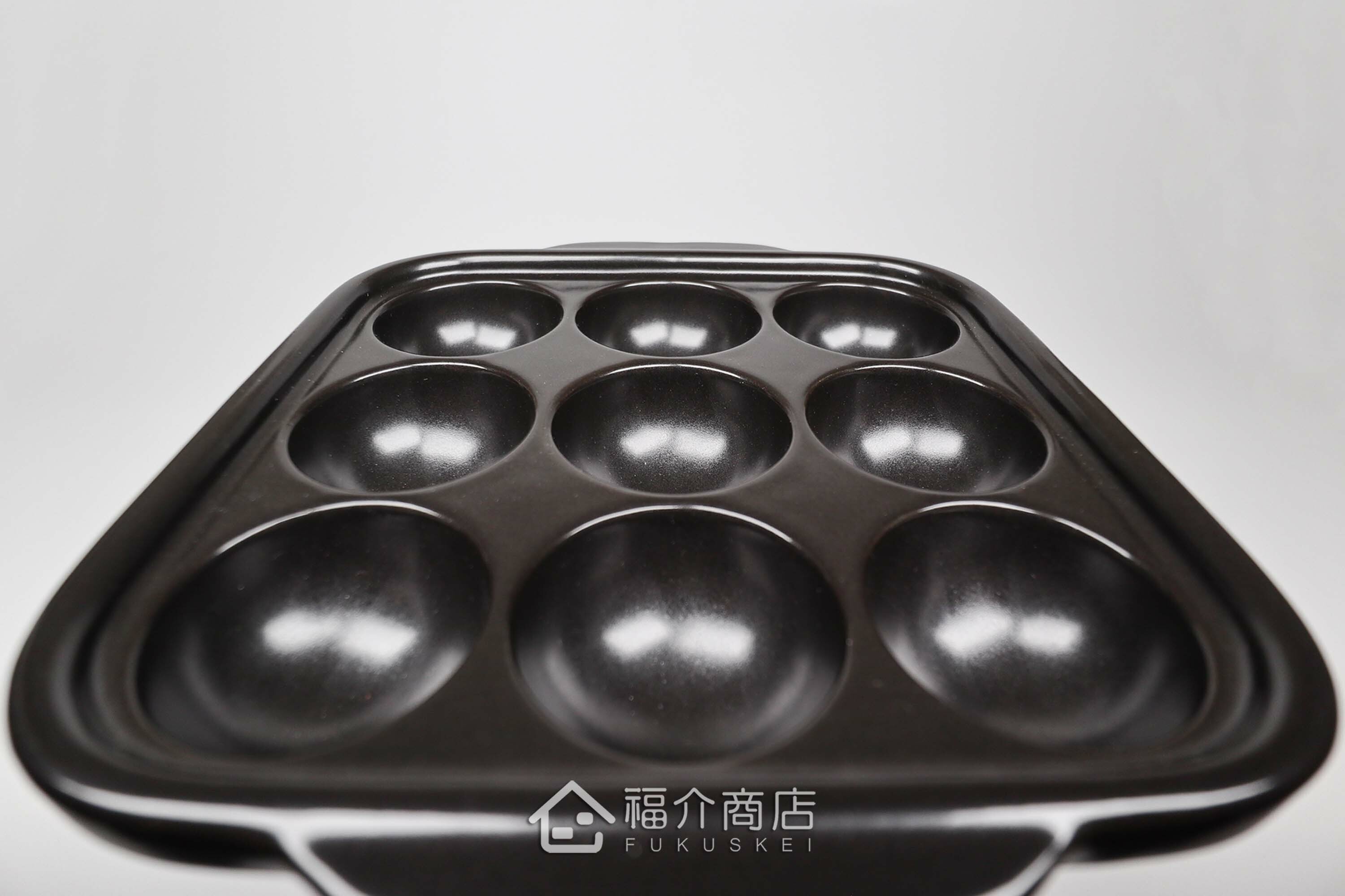 製作章魚燒的耐熱陶瓷烹飪器