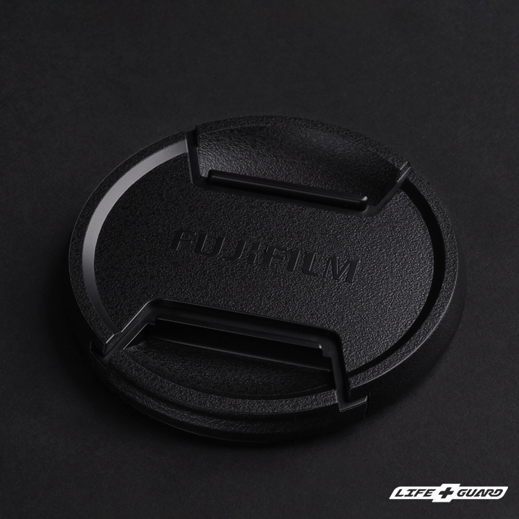 FUJIFILM GF 500mm F5.6 鏡頭蓋貼膜展示圖，LIFE+GUARD 黑色砂紋風格