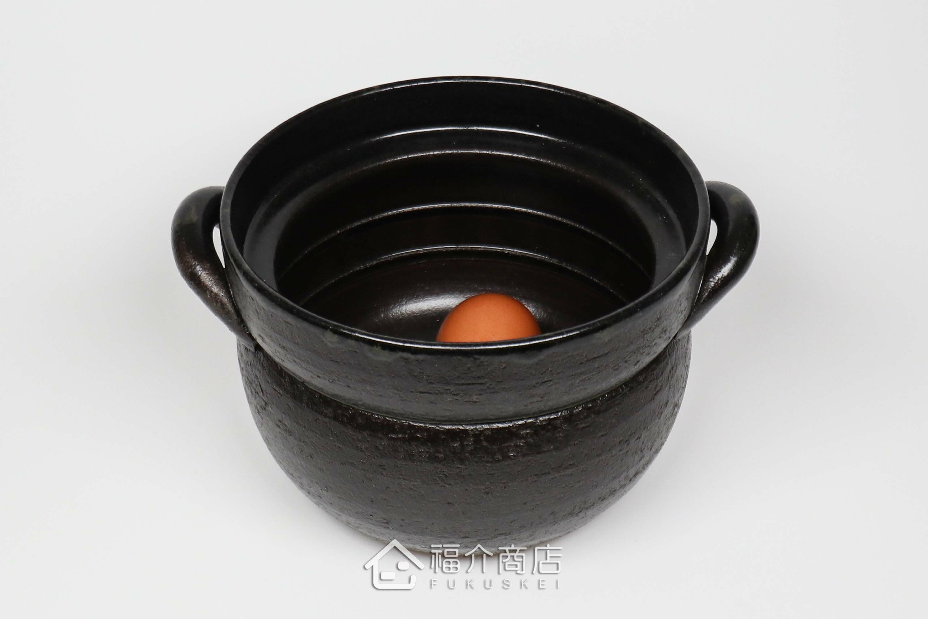 煮飯用陶瓷材質的飯鍋與土雞蛋
