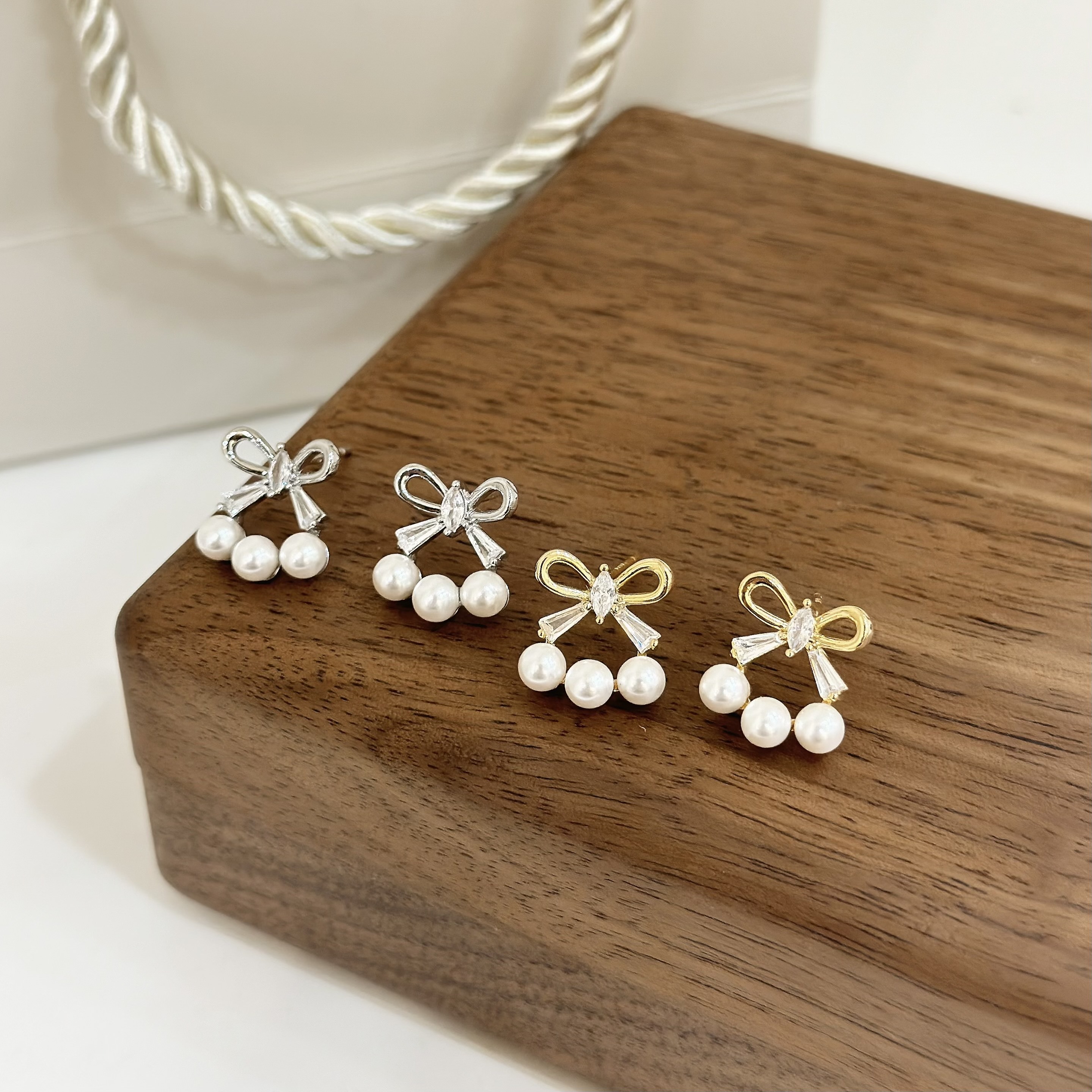 A05蝴蝶結珍珠花圈耳針