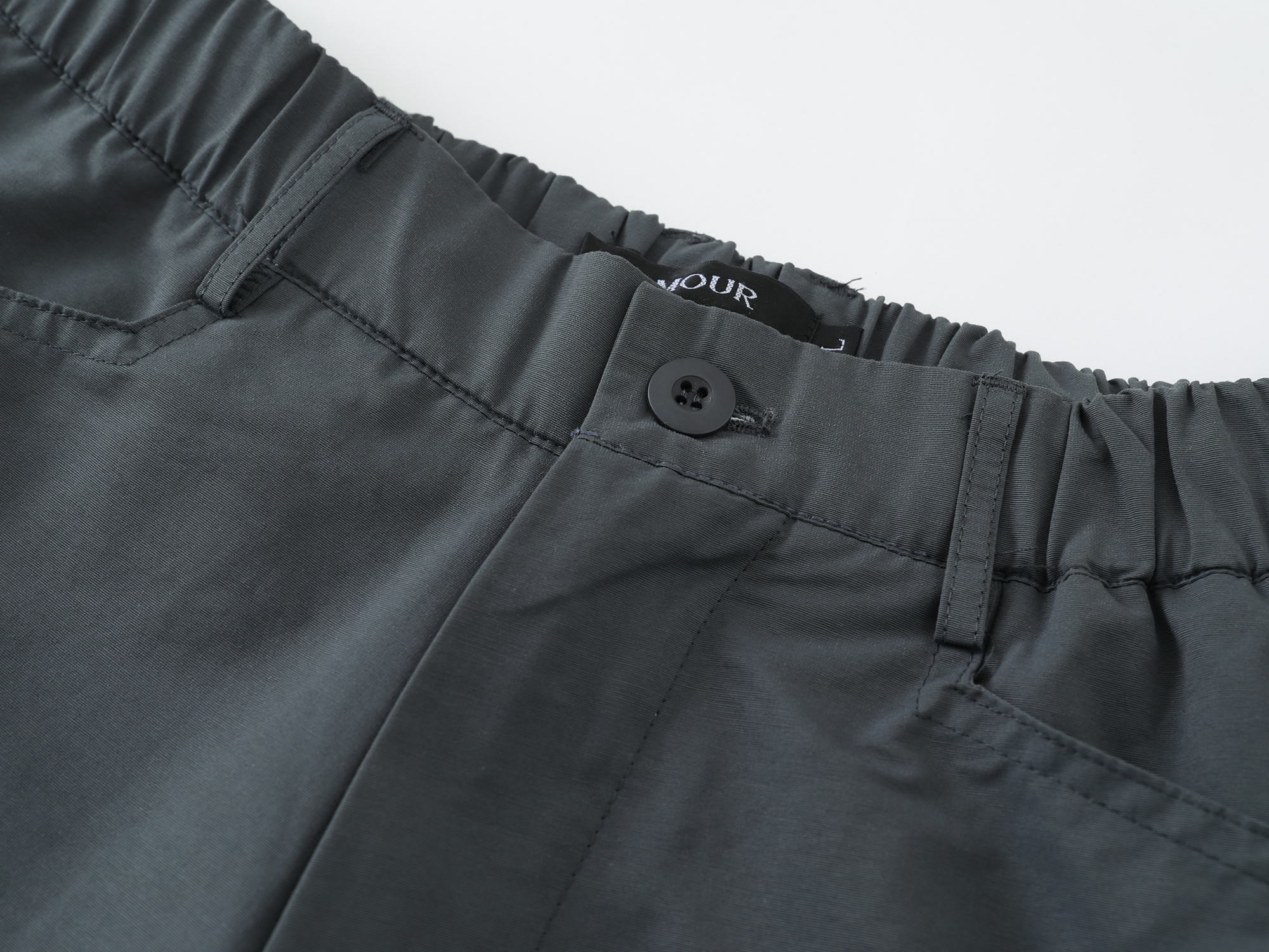 《S.V》剪裁弧線尼龍彎刀褲