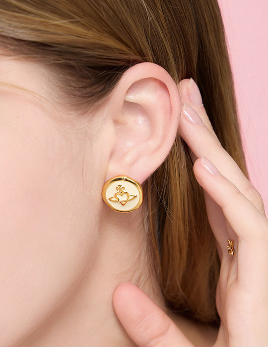 氣質金屬滴釉星球。夾式耳環(米白)