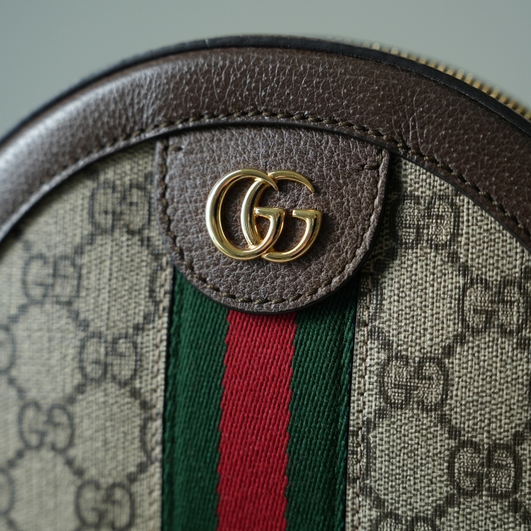 Gucci 老花圓餅包
