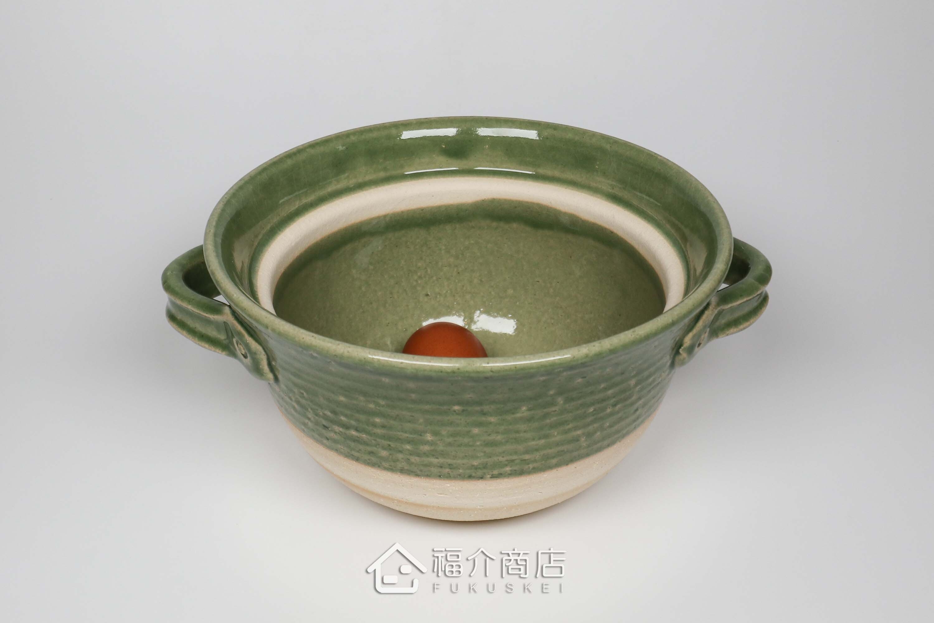煮飯用陶瓷材質的飯鍋與土雞蛋