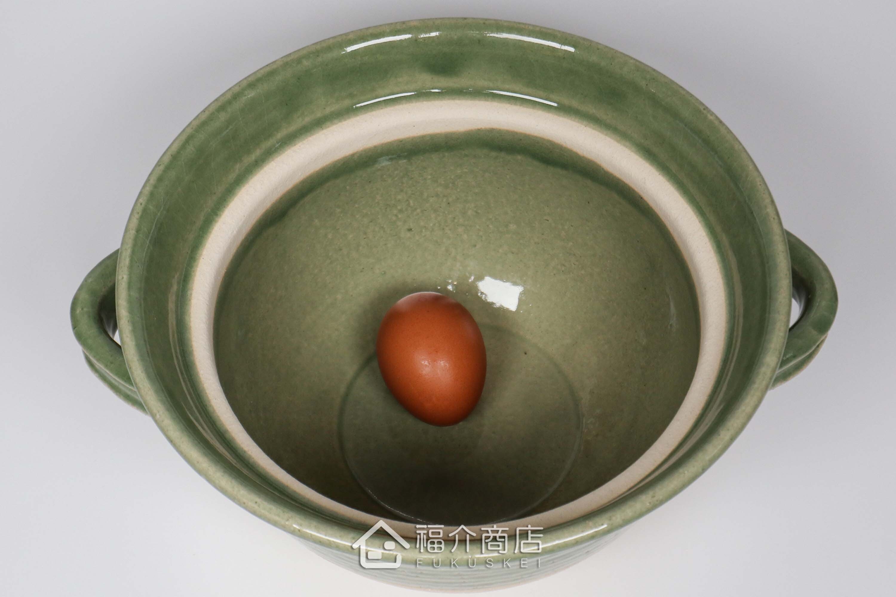 煮飯用陶瓷材質的飯鍋與土雞蛋