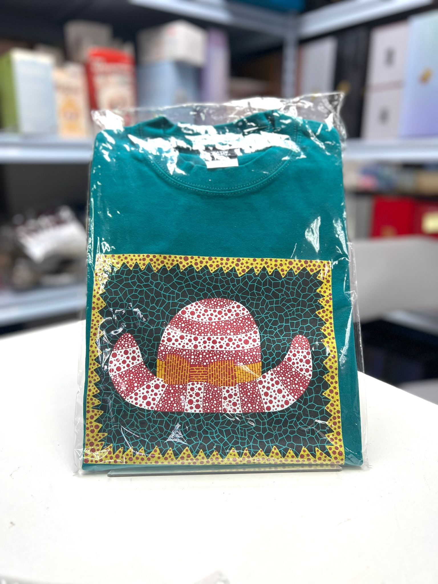 “HAT” Tee from YAYOI KUSAMA PRINT WORKS: REPETITION &&nbsp;PROLIFERATION